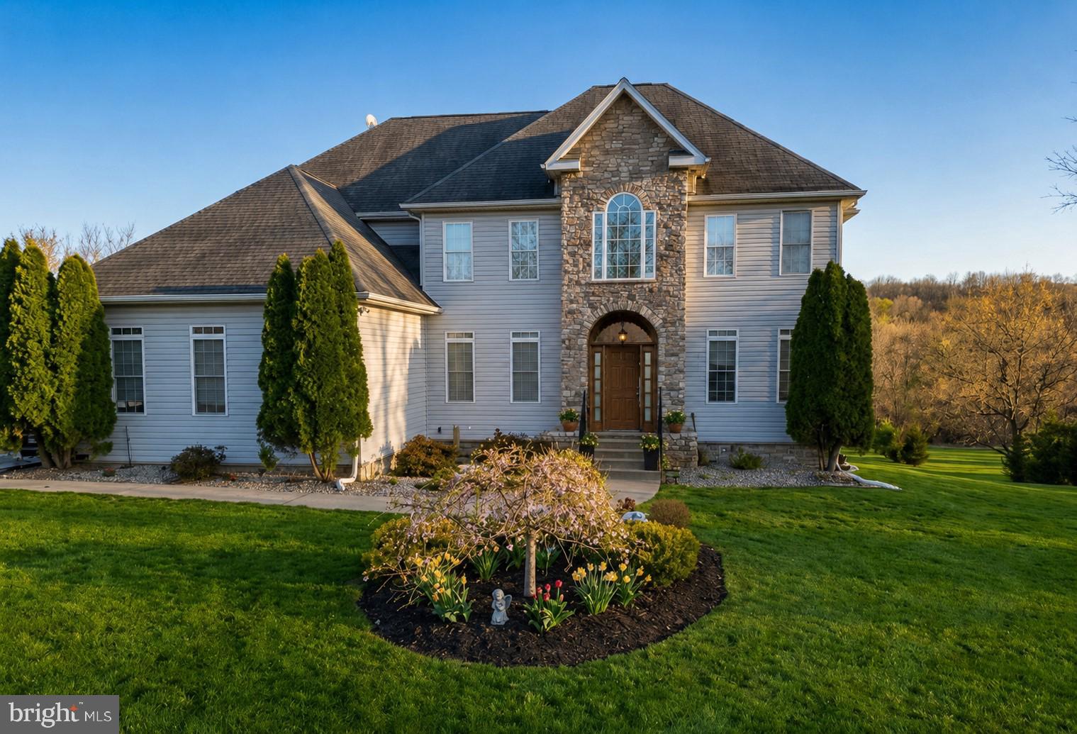 New to the market! Welcome home to this spacious 5-bedroom Colonial offering nearly 5,000 square feet of finished living space on a beautiful 2-acre lot. The main level features a desirable open floor plan, highlighted by newly refinished hardwood floors, fresh paint throughout, and a convenient main-level bedroom with a full bath—perfect for guests or multi-generational living.

The updated kitchen comes complete with all-new appliances with a fantastic new pantry.   Enjoy year-round comfort and energy savings with the efficient HeatMaster G200 outdoor wood boiler. New carpeting has been installed throughout the bedrooms, adding a fresh and inviting touch.

The walkout lower level is designed for flexibility and entertaining, featuring a large recreation room, a potential 6th bedroom, a half bath, and abundant storage space with room for future customization.

Outside, the home sits gracefully on 2 acres with light HOA restrictions, offering both privacy and freedom. This exceptional property combines space, comfort, and value—schedule your showing today before it's gone!
