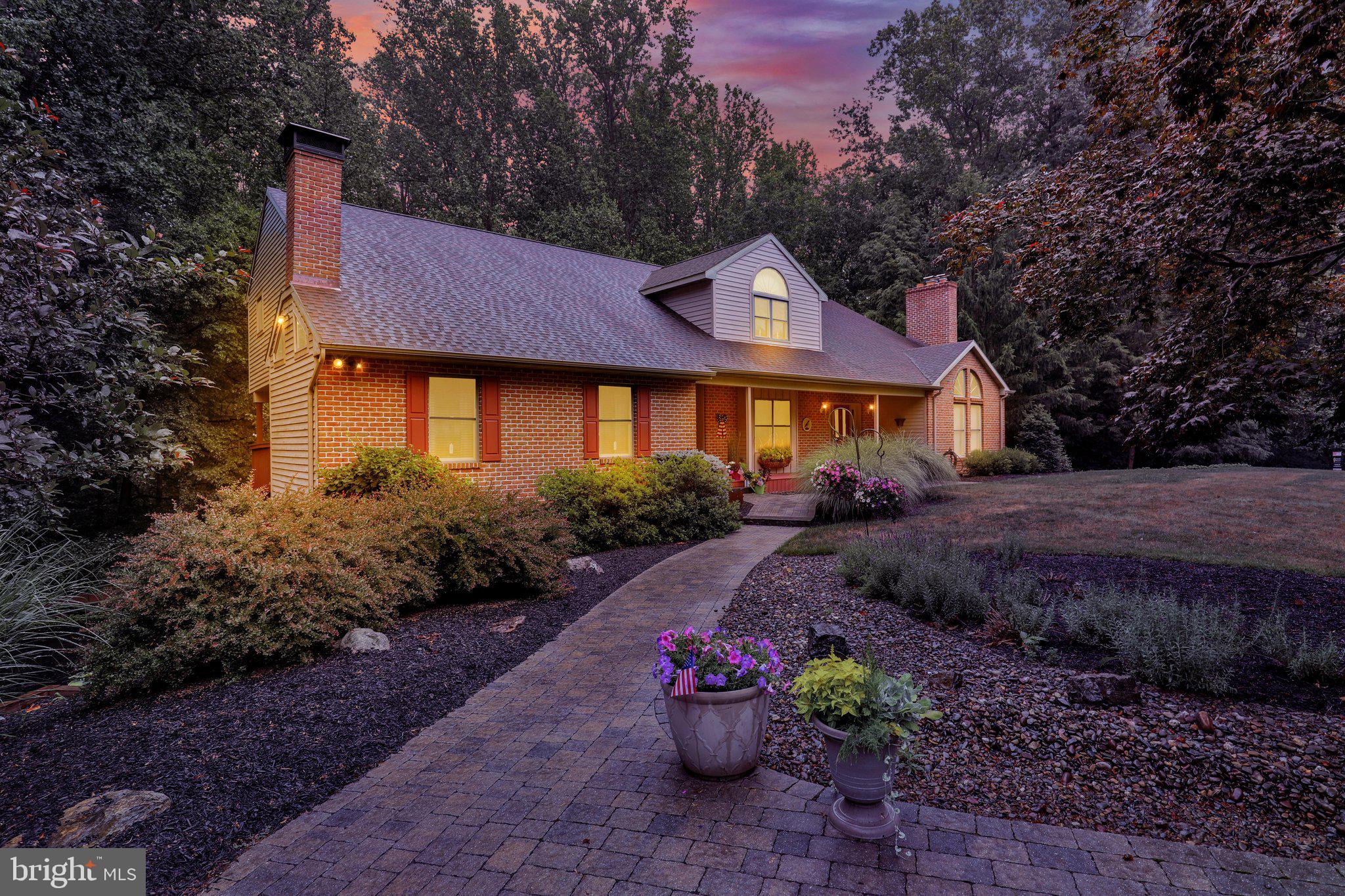 Welcome to 4 Quail Ridge Road, Mohnton, PA—a stunning multigenerational home tucked away in a private, wooded setting just behind Penske, offering the perfect blend of space, comfort, and tranquility.

This expansive residence features 5 spacious bedrooms and 3.5 bathrooms, designed to accommodate a variety of living arrangements while providing room for everyone to spread out and enjoy. Soaring ceilings and abundant natural light create an open, airy atmosphere throughout the main living spaces, while a beautiful fireplace serves as a warm and inviting focal point.

Outdoor living is unmatched with five separate decks and a large patio, creating endless opportunities for entertaining, relaxing, or simply enjoying the peaceful surroundings. Mature landscaping enhances the property's natural beauty and privacy, making it feel like a secluded retreat.

The generous floor plan offers exceptional flexibility, including a finished lower level complete with an additional kitchen—ideal for extended family, guests, or multigenerational living. Large bedrooms, multiple gathering spaces, and abundant room for entertaining make this home perfectly suited for both everyday living and special occasions.

If you've been searching for privacy, space, and a unique setting surrounded by nature, this exceptional property delivers it all.