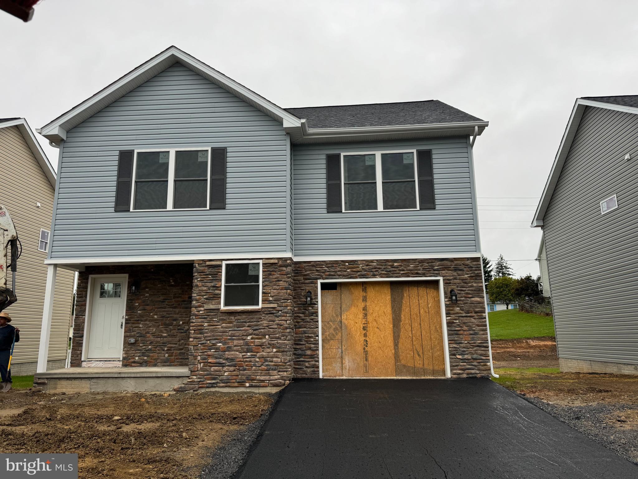 TO BE COMPLETED, OCTOBER 2024 DELIVERY! Make brand new home ownership a reality! Tucked away on the edge of town, with NO HOA you'll find this gem! 3 bed, 2.5 bath new construction home with full basement and attached garage. Home is finished with luxury vinyl plank flooring on main level, stainless steel appliances, upgraded countertops, and upstairs laundry area. The primary suite features a walk in closet, double bowl sinks, and tiled shower. Public water and sewer, paved road, driveway, and sidewalk. *Disclaimer: PHOTOS ARE OF SIMILAR CONSTRUCTION, Lawn digitally enhanced, seeded straw covered to grow,*