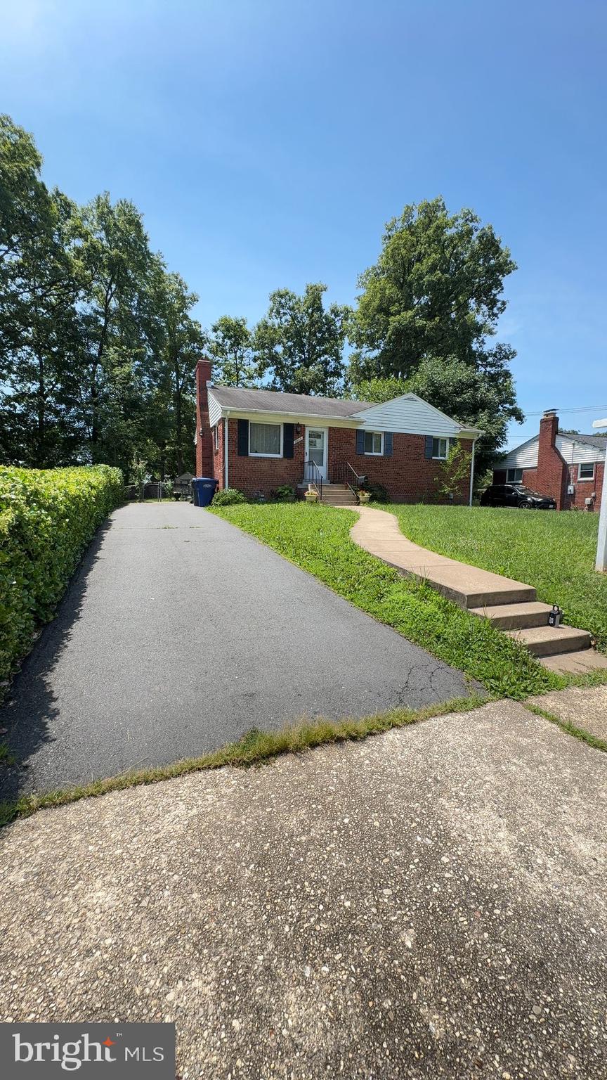 Conveniently located blocks to Rt 50 and 495.  This well maintained home has hardwood floors throughout the main level with three bedrooms and one full bath.  The galley kitchen is a traditional space with laminate countertops, white appliances and wood cabinets.  The lower level has a spacious rec room, utility room with laundry and a full bathroom.  Make this your forever home, remodel or add on, there are so many options.  Don't miss out!
