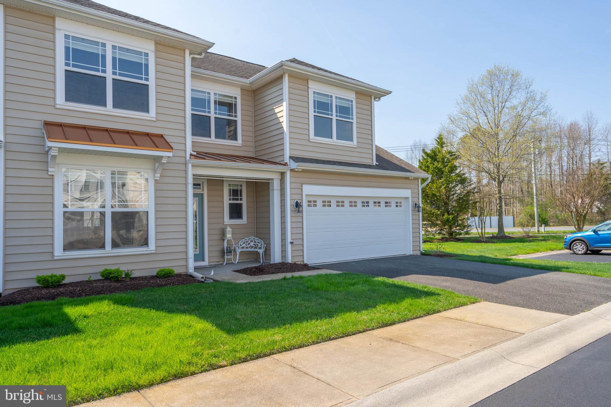 Located in the desirable Ashley Manor community, this END-UNIT TOWNHOME at 36210 Sanderling Drive offers a spacious, light-filled layout just minutes from Delaware’s beautiful coastline. This home features a highly sought-after FIRST-FLOOR PRIMARY suite and an OPEN-CONCEPT main living area with VAULTED CEILINGS and a gas fireplace. THOUGHTFUL UPGRADES have been made with brand new carpet and fresh paint. The end-unit positioning allows for additional NATURAL LIGHT and a more private feel compared to interior units. The kitchen includes maple cabinetry, a pantry, and durable countertops. The main level also includes a convenient half bath, laundry room with utility sink, and access to a finished garage with built-in STORAGE. Upstairs, you’ll find two additional bedrooms, a full bath, and a VERSATILE LOFT SPACE—ideal for a home office, guest area, or playroom. One of the standout features is the LARGE WALK-IN STORAGE ROOM above the garage, offering rare and valuable space, accessible from the upstairs loft area. A major highlight is the installation of a NEW HVAC SYSTEM. Outdoor living at this end-unit home includes a SCREENED REAR PORCH, and a private, spacious feeling yard. The community is WELL-MAINTAINED and ideally located near some of the area’s top coastal attractions, including The Freeman Stage, Fenwick Island, Bethany Beach, and Fenwick Island State Park, offering easy access to beaches, boating, and outdoor recreation. Shopping, dining, and entertainment are also just a short drive away and within easy walking/ biking dstance--don't miss your chance to tour this home today!