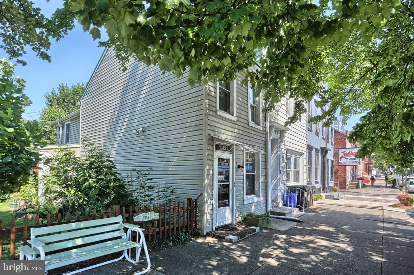 "English Garden and Charm! Popular Mid Town Location! Charming three level townhome in the city with a touch of English Countryside! 3 BDR, 1 BATH, LR,DR, KITCHEN, Basement with laundry area. Balcony off 2nd floor BDR,3rd BDR Loft. Original wood floors. Native garden adjoins.