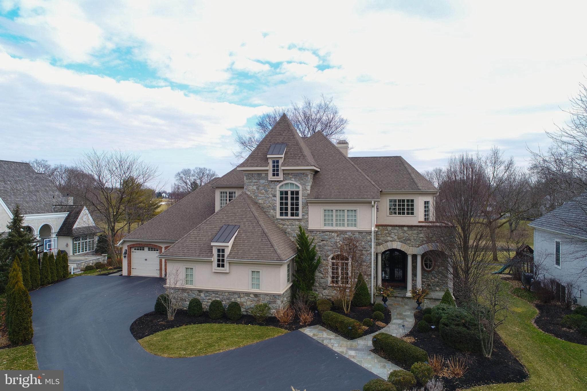 Tour this home with https://my.matterport.com/show/?m=HZQQt1AfPy6&brand=0.   Located in the gated community of Bent Creek, home has a private setting due to location on #8 Fairway, with minimal golf ball traffic. 2-story ceilings throughout first floor highlight the grandeur of the home. Gourmet kitchen with island, separate wet bar, and deluxe appliances. Open floor plan leads to beautiful patio ideal for entertaining. Master bedroom/bathroom with tile shower, separate sitting area with fireplace, balcony, and spacious walk in closet. Fully finished daylight basement with wet bar and workout area.