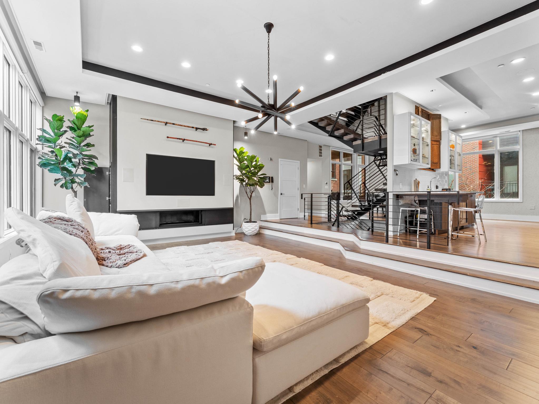 A Rare First Offering. 
A privately curated, custom end-unit masterpiece in one of Philadelphia's most coveted architectural enclaves, freshly refreshed and ready for its next chapter.

Welcome to 822 North American Street, Unit 6. An extraordinary five-story luxury townhome set within an exclusive nine home enclave in the heart of Northern Liberties. Offered for the very first time, this custom end unit residence was conceived with exceptional intention and executed without compromise. Now immaculately refreshed throughout, it presents a rare canvas for the discerning buyer who demands the very best.

Spanning approximately 4,200 square feet across five thoughtfully designed levels, the home commands six bedrooms, five full bathrooms, and one half bathroom. A private elevator services every level, and a dramatic two tier staircase connects each floor with architectural intention, creating a sense of arrival at every level.

The floor plan is a masterclass in flow and scale. The entry level welcomes you with a generous living area, a ground floor bedroom with private ensuite bath, and direct access to a private patio. One floor up, the second level opens into the heart of the home: a chef's kitchen, open dining and living space, a half bath, and a private balcony. The third level is devoted to the primary suite with a spa inspired bathroom, alongside a second bedroom with its own private bath, a balcony, and dedicated laundry. The fourth level delivers an expansive upper living space and three additional bedrooms, one ensuite, two sharing a hall bathroom. And crowning it all a sweeping rooftop deck with commanding Philadelphia skyline views.

A secured two-car garage, private elevator, keyless entry, intercom and security systems, and premium finishes throughout complete a home that has anticipated every need before you knew to ask.

As the end unit within this exclusive enclave, Unit 6 offers the privacy and architectural presence befitting a residence of this caliber  In the heart of Northern Liberties' celebrated dining, boutique retail, parks, and transit, and just minutes from Center City.

Freshly painted and refreshed throughout. Offered for the very first time. An opportunity that will not come again.