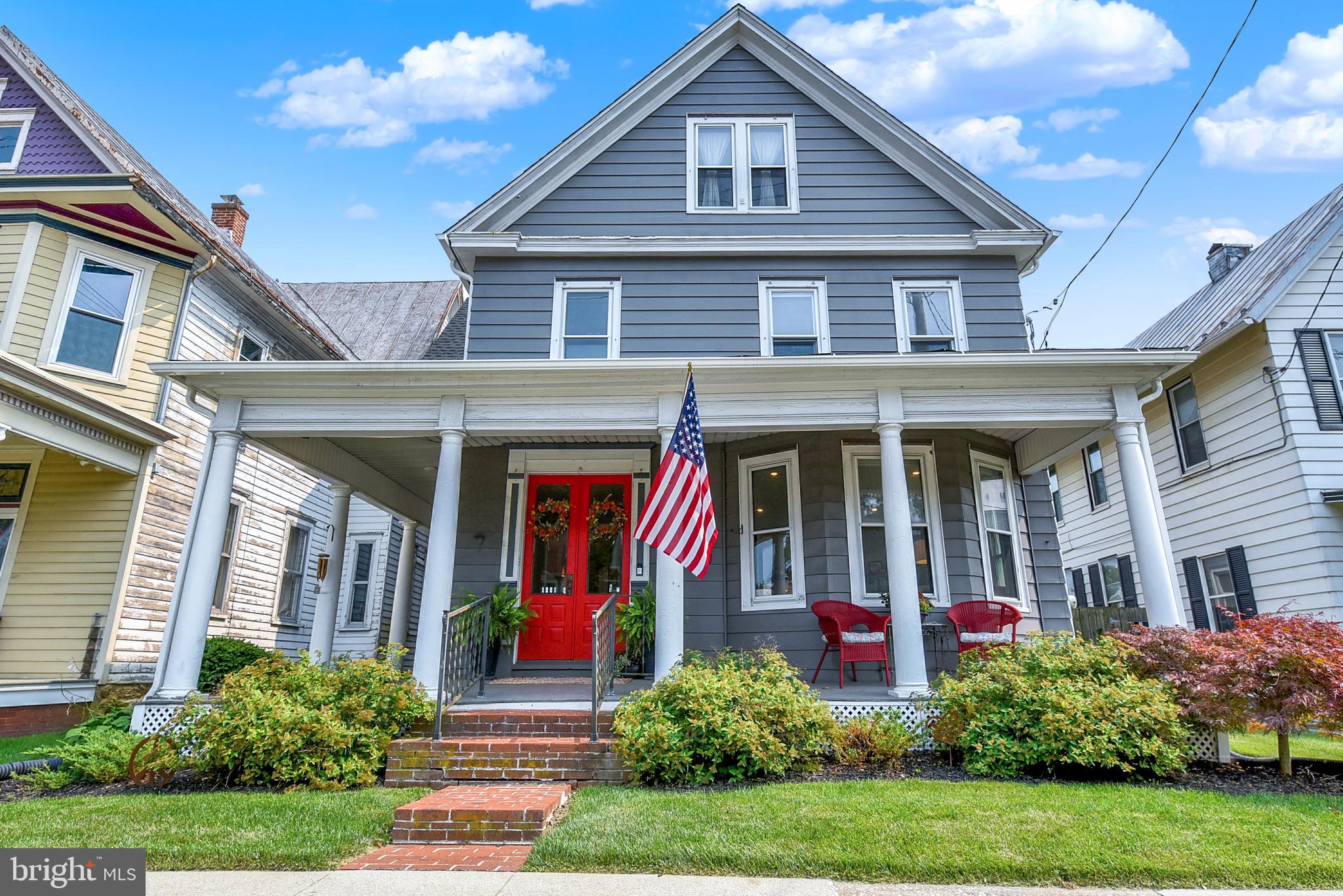 Timeless charm meets modern convenience in this meticulously maintained 4-bedroom, 2.5-bath Colonial, built in 1900. Rich in character, this home features soaring ceilings, beautiful original woodwork, dual staircases, and stunning stained glass windows throughout.

The thoughtful floor plan offers an open, airy feel while maintaining distinct living spaces for comfort and privacy. The updated kitchen is complemented by a spacious walk-in pantry, while generous sized bedrooms, second-floor laundry, central air, and ceiling fans provide the functionality today's buyers are looking for. The spacious primary suite features French doors leading to a private dressing room and a bright en suite bath with an oversized soaking tub. There is abundant additional storage in the third-floor attic and unfinished basement

Outside, enjoy a beautifully maintained fenced yard and a very convenient detached two-car garage. 

This exceptional home perfectly blends historic craftsmanship with modern updates, creating a warm and inviting place to call home.
