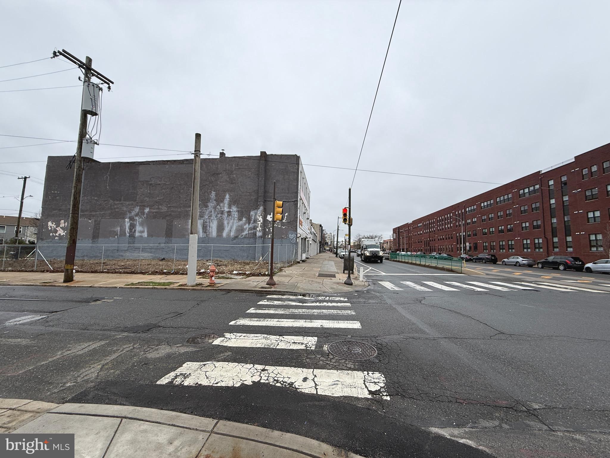 Prime CMX-4 Corner Development  offers a rare opportunity to acquire a corner lot in a prime location along West Girard Avenue in Philadelphia. Zoned CMX-4, this property allows for high-density mixed-use development by right with no strict unit cap, making it ideal for developers and investors, with additional upside through applicable density bonuses. This site has already been approved for development, offering a significant head start. Approved plans include:1 commercial space (2,103 SF), 21 units and 5 parking spaces
Plans may be modified or redesigned, giving buyers the flexibility to tailor the project to their specific vision while still benefiting from the existing approvals.
The corner location provides dual frontage, excellent natural light, and flexible design options—perfect for ground-floor commercial with residential units above. Strong visibility and accessibility make this a standout site for a variety of development strategies.
Conveniently located near public transportation, major roadways, and neighborhood amenities. Surrounded by ongoing development and growth.
Great opportunity to build in a high-demand, rapidly developing area.