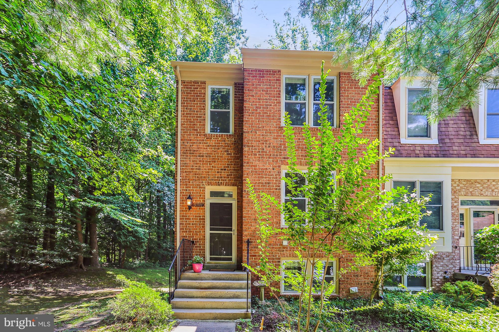 OPEN HOUSE CANCELLED SAT 3/23 & SUN 3/24 2-4 PM .......Welcome to this wonderful  & updated 4 bedroom, 3.5 bath, brick end unit townhome located in the desired Timberlawn community. The home is light and bright with many windows and skylight. The main level boasts beautiful hardwood floors, a living room/dining room combination, and a renovated powder room.   Enjoy the renovated kitchen with lots of white cabinets, quartz counters, stainless steel appliances, and a sliding glass door to a large deck. The kitchen has plenty of room for a table or you could make a small family room off the kitchen.  The primary bedroom boasts 2 closets, beautiful Brazilian Cherry hardwood floors, cathedral ceilings, and a private renovated bathroom.  Two additional bedrooms with cathedral ceilings.  The renovated hall bathroom completes the upper level.  The lower level consists of a good-sized 4th bedroom plus a renovated bathroom with walk-in shower. The rec room has a small kitchen set up and the sliding glass door opens to a flagstone patio. There is a large storage room and another room with shelves for additional storage.   The home is minutes away from the Grosvenor Metro, 495, & 270, Pike & Rose, downtown Bethesda, NIH & Walter Reed. Don't miss seeing this wonderful end unit townhome in your search!!!!