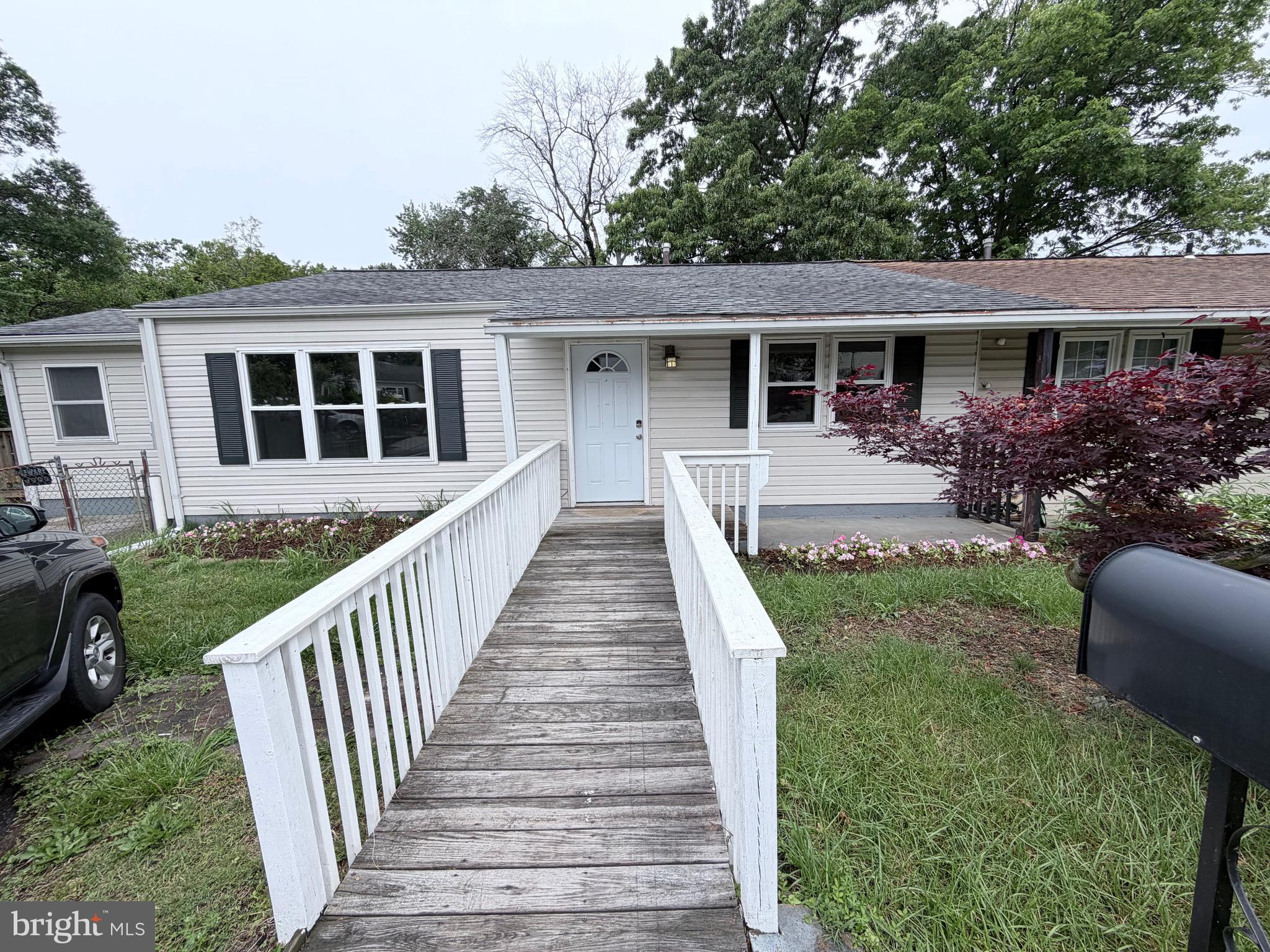 RECENTLY  UPDATED DUPLEX WITH HANDICAP ACCESSABILTY. FRESHLY PAINTED. NEW KITCHEN NEW FLOORING THROUGHOUT UPDATED BATHROOMS ONE IS HANDICAP ACCESIBLE. LARGE BACK YARD WITH 2 SHEDS (SHEDS ARE AS IS). PLEASE REMOVE MOVE SHOES
