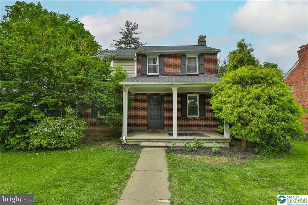 Charming West Bethlehem Brick Colonial. Experience solid craftsmanship and timeless style in this highly sought-after West Bethlehem neighborhood. This 4-bedroom home features durable solid brick construction and elegant oak hardwood floors throughout the main living areas and bedrooms. Key Highlights: Modern Kitchen: Recently renovated with stylish finishes—perfect for the home chef. Living Room: Inviting and warm, anchored by a classic fireplace. MAJOR UPGRADE: Peace of mind comes included with a BRAND NEW ROOF scheduled for late May! Flexible Space: A partially finished basement offers great potential for a home office, gym, or playroom. NOTE: a bath was removed in the basement. Plumbing remains to install again.  Enjoy a perfect blend of character and peace of mind in a location that puts you minutes from everything Bethlehem has to offer.