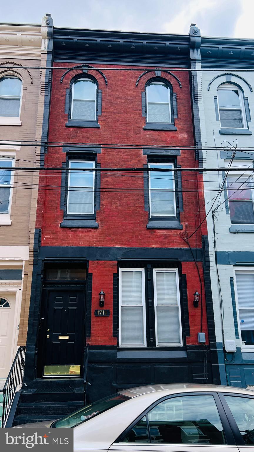 BREWERYTOWN GEM — METICULOUS TRIPLEX | INVESTOR DREAM & FIRST-TIME BUYER OPPORTUNITY!
Welcome to 1711 N. 26th Street — one of Brewerytown's most well-maintained income-producing triplexes, perfectly positioned in one of Philadelphia's hottest and fastest-growing neighborhoods! Whether you're a seasoned investor looking to strengthen your portfolio or a first-time buyer ready to let your tenants pay your mortgage, this stunning 3-story brick beauty checks every box!
THE NUMBERS SPEAK FOR THEMSELVES: This income powerhouse projects $4,400–$4,800/month ($52,800–$57,600 annually) at market rate rents — and is also fully Section 8 approved with PHA payment potential of $3,800/month. With 2026 real estate taxes of just $2,880, your net operating costs are exceptionally low for a Philadelphia triplex of this caliber.
THREE UNIQUE & FULLY UPGRADED UNITS:
Unit 1 (1st Floor — 1BR/1.5BA) is a showstopper featuring gleaming white oak hardwood flooring in the bedroom, rich African cherry hardwood throughout common areas, a charming faux fireplace, a rare rear bonus room with glass block window, rear patio with aluminum siding, and full central air/heat plus baseboard backup. Every detail screams quality — steel security doors, ceiling fans throughout, electric hot water heater, and all appliances included.
Unit 2 (2nd Floor Rear — Studio) oozes character and charm with its wood arched interior door, vintage-inspired clawfoot bathtub, waterproof flooring, faux fireplace, stainless steel sink, and fresh paint throughout. Recently upgraded and move-in ready — a tenant's dream at an investor's price point.
Unit 3 (2nd/3rd Floor Front — Bilevel 2BR) is the crown jewel — a newly renovated, two-floor bilevel unit featuring brand-new ceramic tile bathroom, porcelain flooring in bath and kitchen, new aluminum windows, new carpeted staircase, all-new appliances, new fixtures, and waterproof flooring throughout. This unit commands top-of-market rents and will attract quality, long-term tenants immediately.
BUILT TO LAST — UPDATED TO IMPRESS: This property has been continuously and thoughtfully maintained with major capital improvements already done for you: new service line (2024), freshly painted exterior (2025), new exterior door (2025), brand-new exterior lighting (2026), new cement front (2022), fire alarm system with pull station, and each unit featuring its own separate electric panel and utilities — protecting your investment and keeping tenant disputes over bills a thing of the past!
LOCATION, LOCATION, LOCATION: Situated on the corner of Cecil B. Moore Avenue in the thriving 30th Ward, this property puts your tenants within walking distance or a short ride from everything Philadelphia has to offer — Fairmount Park, the Philadelphia Museum of Art, the Philadelphia Zoo, Reading Terminal Market, Temple University, top-rated restaurants on Girard Avenue, boutique shops, craft breweries, and easy SEPTA access connecting to all major corridors of the city. This is the neighborhood buyers and renters are moving TO — don't miss your chance to be a part of it!
THE BOTTOM LINE: Zoned R10/RSA-5 · 1,725 sq ft · Lot 15×66 · 4BR / 3.5 Bath · Street parking · Brick exterior · Built 1929 with the bones to last another century. Schools nearby include Vaux, Big Picture, and Kelly Williams. A rare opportunity in a market moving fast — priced to move. 

Don't wait — Brewerytown properties at this price point and condition level are disappearing fast. Schedule your private showing today and start building generational wealth in one of Philadelphia's most exciting zip codes!