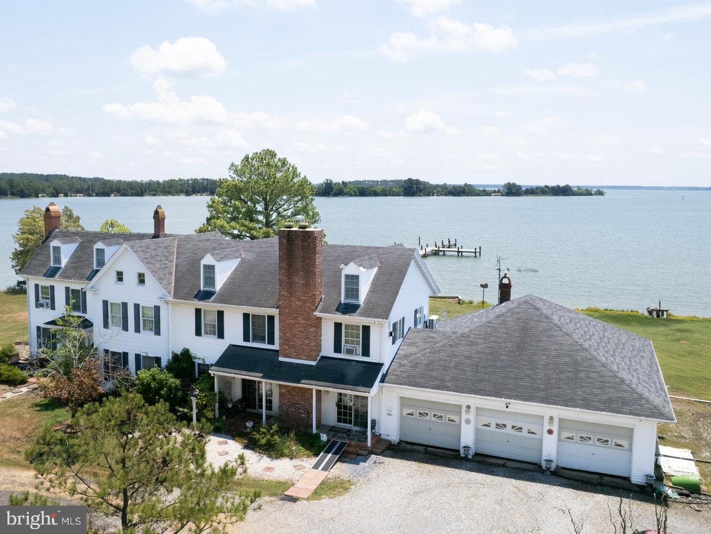 Rare  50+ acre point of land! Featuring deep  waterfront on Hudson Creek, this property is an Eastern Shore dream!  Loved by one family since the 1950's,  this property is just waiting for you to make it your own!   The   traditional home  is  in need of updates.  Large rooms offer fantastic views.  Three fireplaces,  and craftsmanship is evidenced throughout.  The attic room was finished by a local boat builder-beautiful wood detail. There is an attached 3 car garage and workshop.  The water side pool is professionally maintained with a spa and gas heater.
This is an all around fantastic  hunting property, if it roams the Shore it is here -- turkey, whitetail, small game, geese and duck.  Licensed off shore blind. Sika have been spotted.
Nice pier with deep dockage (at least 4').  Sandy beach area by the "swimming hole".  Property had two additional perc sites approved.  Very private.  Perfectly sited for sunrise and sunset.