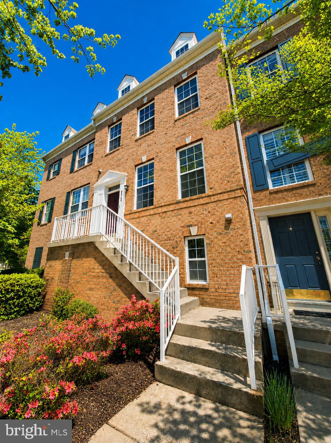 Spacious townhome in the highly sought-after Clarksville community, beautifully updated throughout with fresh paint, stylish lighting, renovated bathrooms, LVP flooring, new water heater, and more. A sun-filled open floor plan showcases gleaming hardwood flooring, recessed lighting, and seamless flow across the main level living spaces. The inviting living and dining areas open to a versatile family room or casual dining space featuring a cozy gas fireplace and access to the private deck. The chef’s kitchen is appointed with granite countertops, stainless steel appliances, and refreshed white cabinetry.  Upstairs, the spacious primary bedroom retreat offers a large walk-in closet and a remodeled luxury en suite bathroom featuring a soaking tub, dual quartz vanity, glass-enclosed shower with decorative tile inlay, and stylish modern hardware accents. Two additional bedrooms and an updated hall bathroom complete the upper level.
The entry level includes a spacious recreation room, full bathroom, laundry area, and access to the attached two-car garage. Ideally located near major commuter routes, shopping, dining, and entertainment options, this exceptional home combines comfort, style, and convenience.