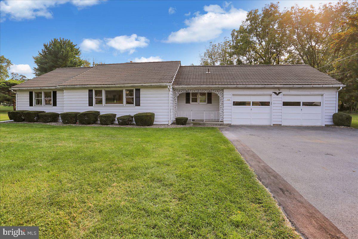 Rancher on a half acre! Beautiful home with stunning hardwood floors throughout. Enter into the large living room with great natural light. Eat in kitchen has been updated with Granite Countertops, Tile Backsplash, New Stainless Steel Appliances. Tons of cabinet space and pantry. Large open hallway leads you to 3 generous sized bedrooms with ample closet space in all. Full hall bath. Everything you need for 1 floor living. Fully finished basement with possible in-law quarters. Cabinets with sink and stove. There is a walk out in the lower level along with laundry room, additional full bath area and storage space. All sitting on a half acre, shed, 2 car attached garage & a concrete tile roof.