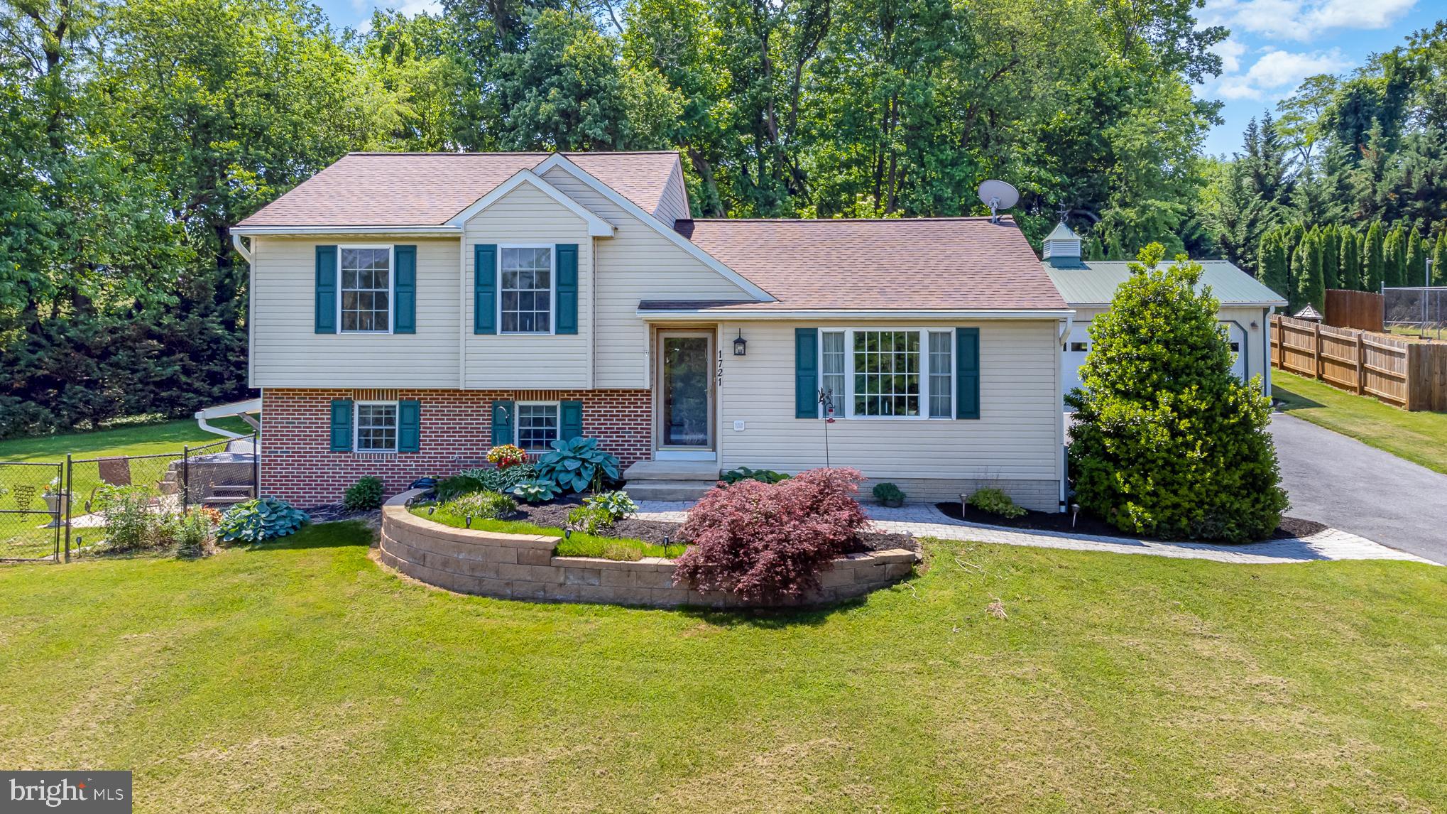 This is a must see! Roof replaced 2017, HVAC replaced 2020 and ducts cleaned Feb 2022, water heater replaced 2020, re-painted 2022 and fresh landscaping makes this beautiful oasis like new! Gutter Guards installed 2014, Kitchen updated 2012, bathrooms updated 2019. Basement includes shelving and laundry station and has potential to be finished! Cathedral ceilings, open floor plan living space and all seasons room featuring wood burning fireplace (cleaned 2021) include screens for summer and beautiful French doors! Hot tub is only 4 years old for all year relaxation! Fruit bearing bushes are almost ready for harvest...great snacking when passing with the lawn mower or enjoying the serenity of the area! Detached shed with electric for all your outdoor needs is a bonus on top of the detached garage with extra storage space with shelving included! Septic pumped 2021...all you have to do is move in! *Property adjacent to Forest Conservation Area*