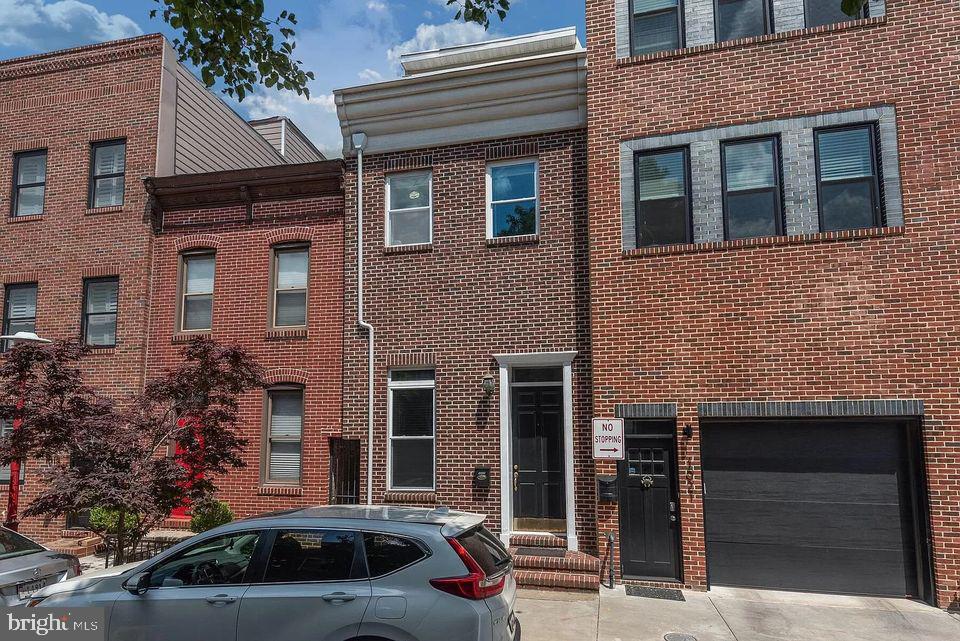 Amazing 4 bedroom, 4 full bath row home in the heart of Canton truly just steps away from Canton Square! The living room features gleaming hardwood floors, 9 ceilings and recessed lighting. The bright, eat-in kitchen hosts shaker cabinets, a sizeable pantry and access to the fully-fenced in patio. On the third floor, find a master en-suite with an attached bonus room - could make a great office, nursery or converted into a 5th bedroom! This home is perfect for roommates, with each room having its own personal bathroom. This home offers great access to restaurants, grocery stores, entertainment and parks, as well as fantastic commuter access just minutes from 895 and 95.   Professionally managed!  Schedule your showing today!