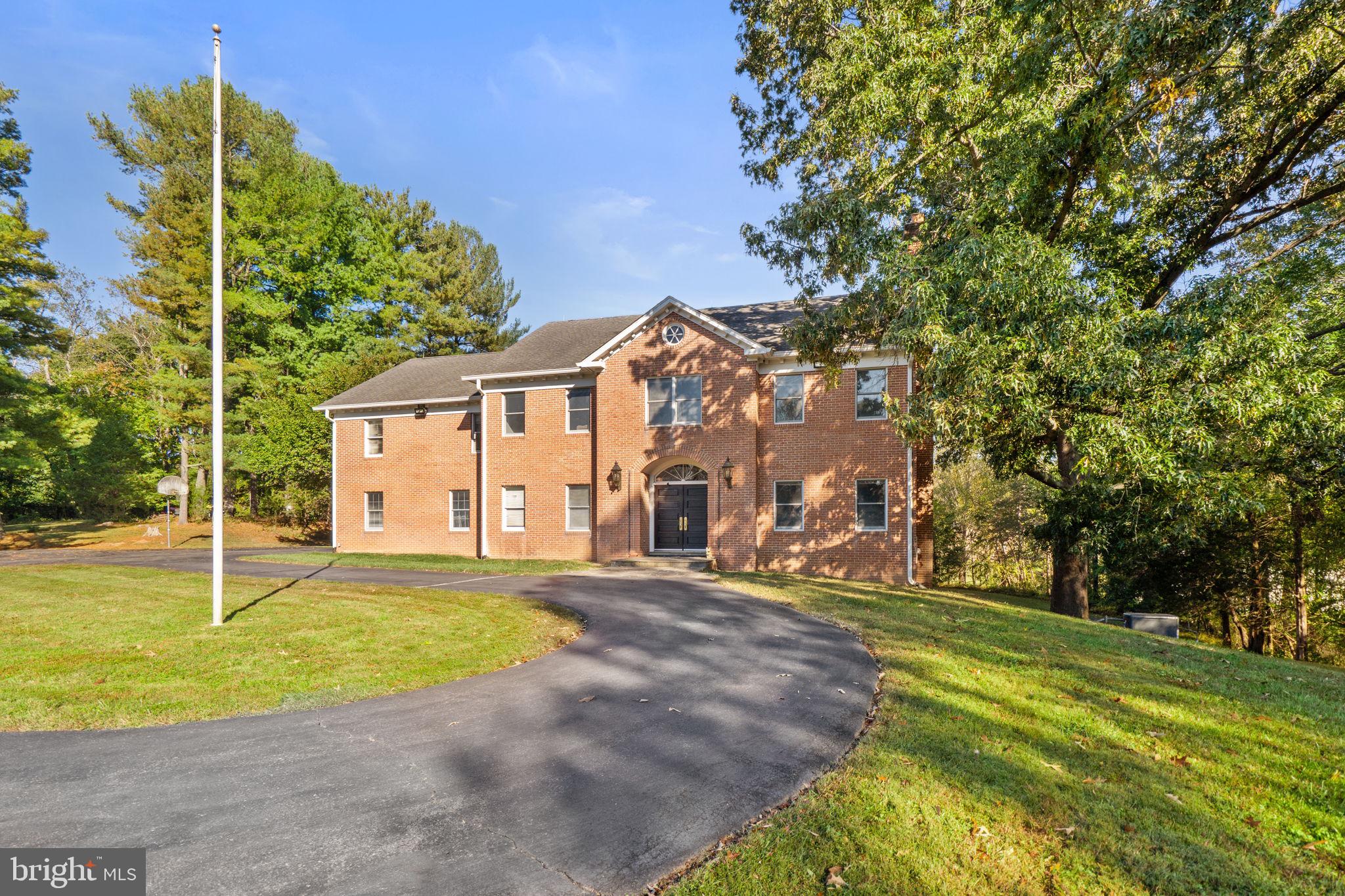 ***Best Lot in Mclean***Stunning five-acre estate parcel nestled between McLean and Great Falls.** This exquisite property features a beautiful six-bedroom, six-bath brick home with a pool and a spacious detached two-car garage. Enjoy a peaceful, country-like setting while being just minutes from Tysons Corner, Reston, and downtown McLean. With convenient paved road access and surrounded by mature trees, this is a rare opportunity to own a prime estate-ready parcel with existing infrastructure in one of the most sought-after locations in McLean/Great Falls.