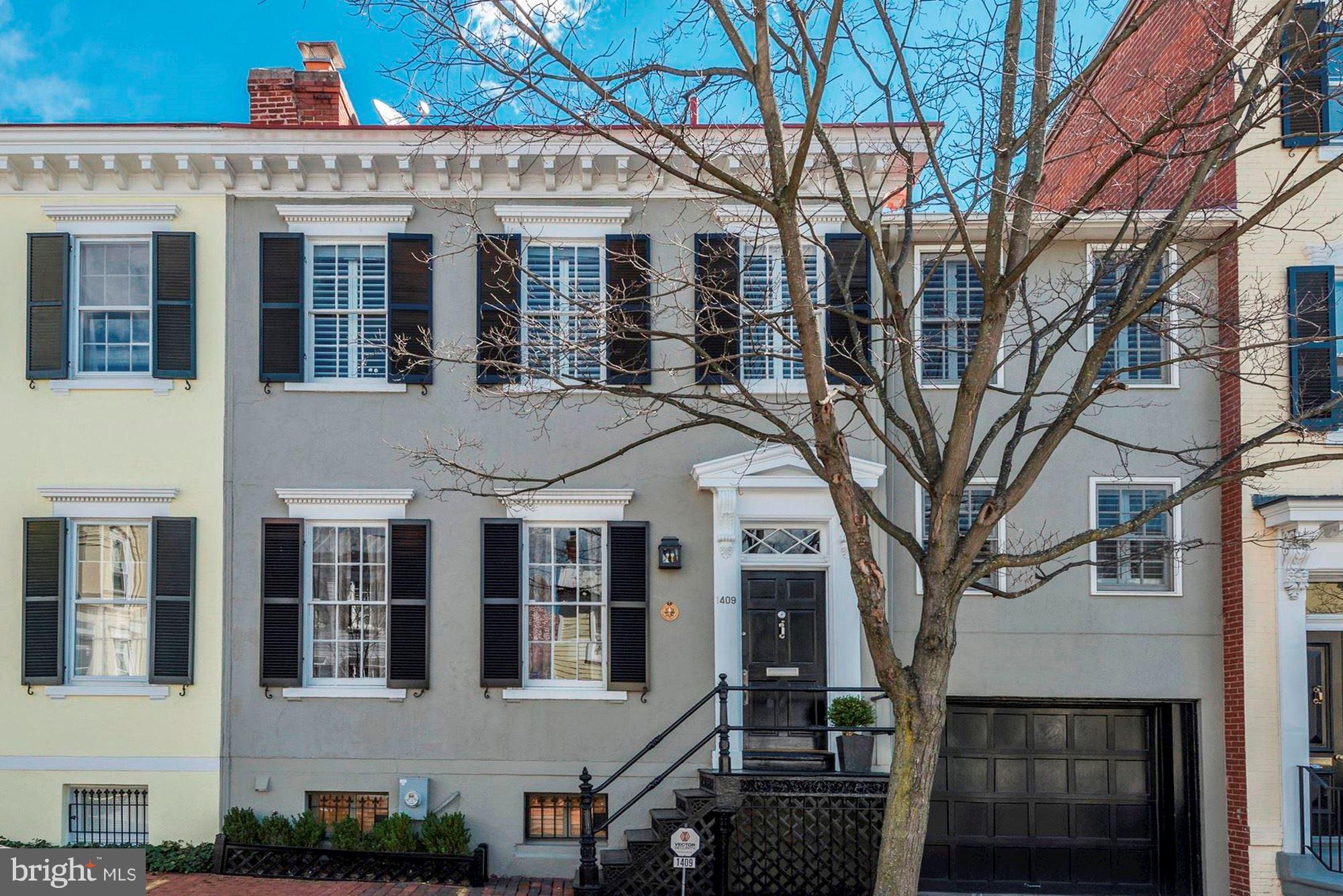 Light filled East Village Federal! Completely renovated w garage, pool, wonderful living & entertaining spaces. LR, DR, kit-fam room, PR and coat closet & access to garden, all on entry level. Incredible master suite, and 2 more BRs, a BA & office on the upper level. Playroom, 4th BR w BA, laundry room, second kitchen, storage room & access to garage and garden on LL.