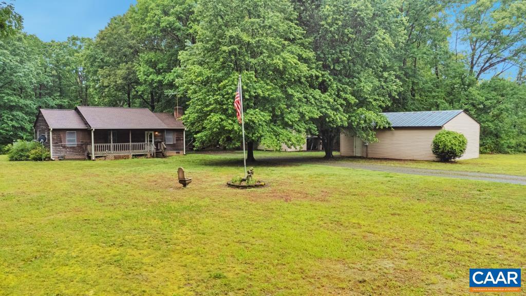 Welcome to 2715 Bethany Church Road in Bumpass, Virginia ? opportunity is knocking at this charming country property! With a little vision and some work, this home could truly become your dream home.  Offering 3 bedrooms and 2 full baths, the home features a spacious eat-in kitchen and a comfortable layout ready for your personal touches. Major updates have already been completed, including a brand-new HVAC system and a newer roof that is less than 5 years old.  Situated on 2.51 beautiful acres, the property provides a peaceful setting with plenty of room to enjoy the outdoors. The fenced backyard is perfect for pets and offers both privacy and space to relax or entertain. A huge detached garage with its own electrical meter makes an ideal workshop, storage area, or space for car enthusiasts, and an additional shed provides even more flexibility.  Conveniently located near Bethany Christian Church and just minutes from Route 33, the property offers easy access to nearby areas including Montpelier while still maintaining a quiet country feel. Property is being sold strictly as-is, and the seller will make no repairs. Don?t miss the chance to turn this property into something special!