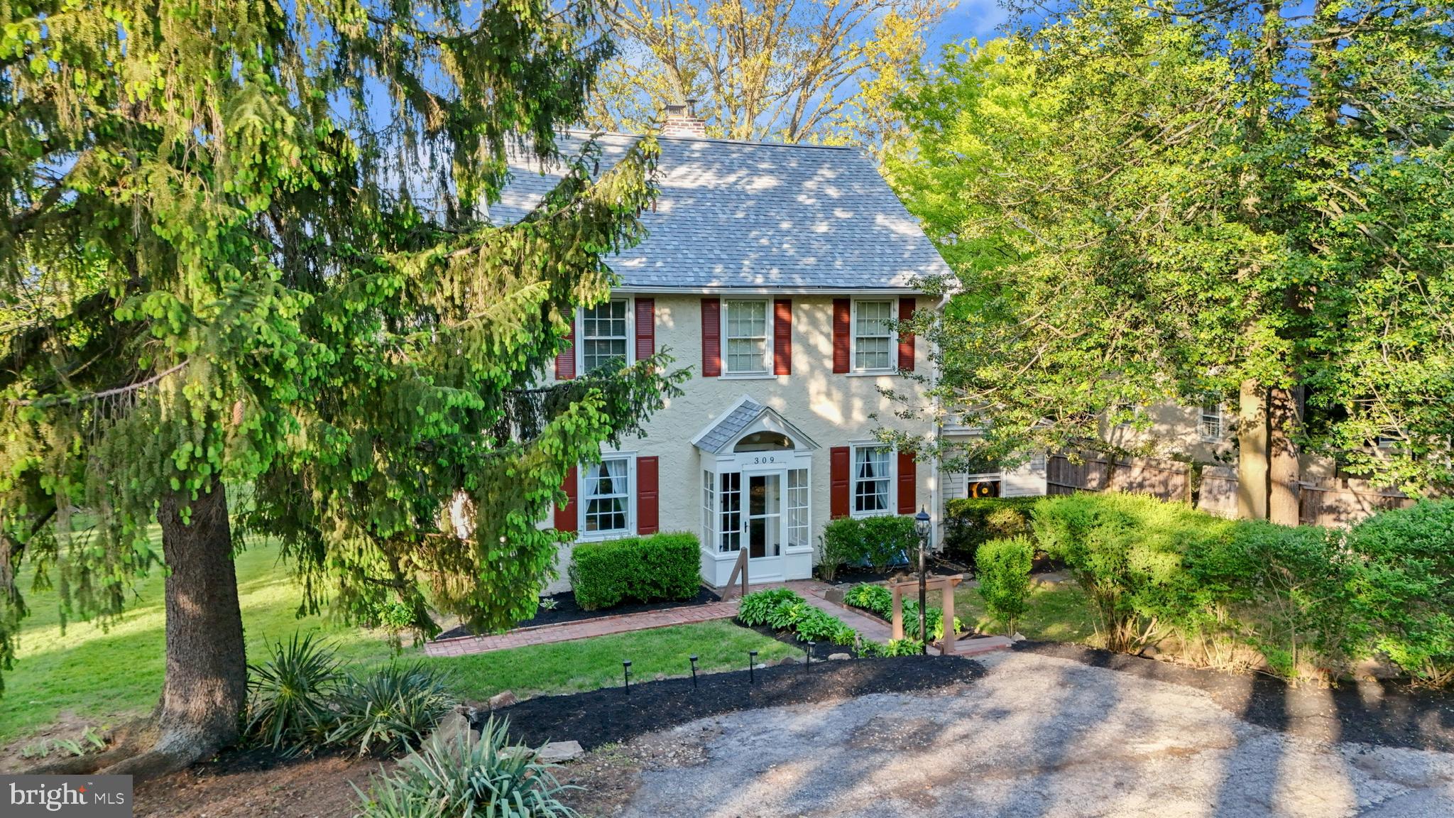 Welcome to 309 Conestoga Road — a rare opportunity in the heart of Radnor Township, located within the highly regarded Radnor Township School District and just steps to downtown Wayne, the Radnor Trail, and directly across from the Wayne Art Center.

BONUS OPPORTUNITY: An adjacent separately parceled vacant lot at 307 Conestoga (50 x 239) may be available for purchase.

A major 2022 addition nearly doubled the home’s size and completely transformed the way it lives. At the center is a stunning open-concept kitchen and family room designed for both everyday living and entertaining. The kitchen features granite countertops, stainless steel appliances, and a large center island, all flowing seamlessly into a bright, expansive family room filled with natural light.

The first floor also offers a formal dining room, a comfortable front living room with fireplace, and a private den or office with sliding doors leading to a side deck. A relocated and fully renovated half bath completes the level.

Upstairs, the oversized primary suite is a true retreat, featuring a walk-in closet and a beautifully designed en-suite bath with an oversized shower, dual shower heads, and double sinks. Three additional bedrooms provide flexibility for family, guests, or workspace, along with a new full hall bath with double sinks. Washer and dryer hookups have also been roughed in on the second floor, offering the potential for added convenience.

The full basement includes a partially finished area plus a substantial 28 x 28 walk-out addition already equipped with air conditioning, high ceilings, multiple windows, sliding glass doors, and rough plumbing for a future full bath — a blank canvas ready to be customized.

Significant upgrades include conversion to natural gas, central air (2022), updated boiler and water heater, full plumbing and sewer line replacement, electrical upgrades removing all knob-and-tube wiring, and a new roof.

Rare, refined, and impossible to duplicate. This is the one buyers wait for and regret missing.

(Any sale of 307 Conestoga would be subject to separate pricing, terms, and seller approval. Buyers are responsible for their own due diligence regarding zoning, permitted uses, and development potential.)