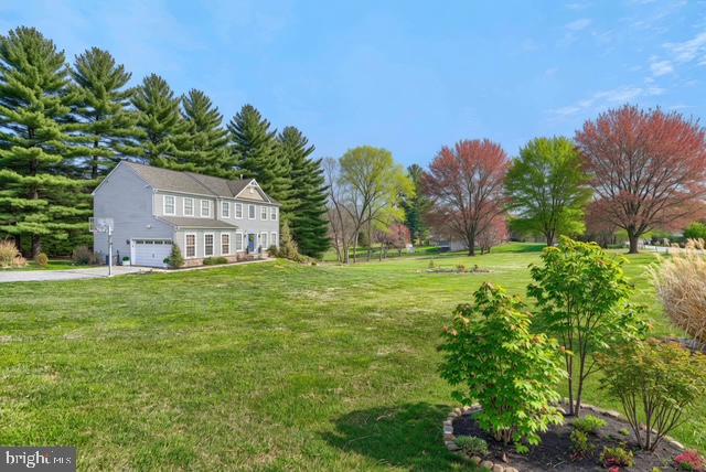 Welcome to 3825 Jarrettsville Pike, nestled in the rolling and lush hills of Harford Country Horse Country.  This is a "best of both worlds opportunity" offering the charm of a colonial estate and the maintenance free life-style of a nearly new home.  Inspiration abounds with excellent indoor entertaining space and breezy outdoor greenery.  Key features include:  a kitchen with an island, and a bar area for casual dining; table space for a group dinner by the deck; a cozy living room with a gas fireplace; a separate dining area that adds a touch of luxury, and a den or study for a quiet get away. The upper primary suite is a spa like retreat. A sunken tub, a large walk-in shower and 2 oversized walk-in closets, what more could you want? The bedroom area itself has vaulted ceilings and gorgeous natural light. Three additional bedrooms and another bath complete the lovely top level. Still looking for more space? The lower level is excellent for overflow, there is a large family room with level walkout to the side yard, another bedroom, a full bath and work out room. Unfinished storage area is also available. All of these wonderful features are located within 25-30 minutes of Towson and 10 minutes to local shopping and restaurants. 3825 Jarrettsville Pike is your destination!