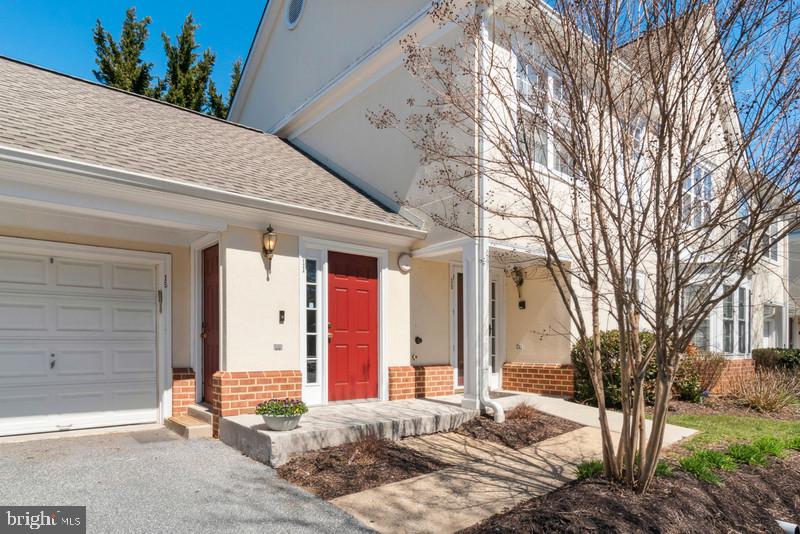 Welcome to this beautiful condo located in the gated community of Grey Rock Flats in Pikesville!  This beautiful home is spacious and inviting with a huge family room and eat in kitchen.  Two large bedrooms and two baths located on opposite sides of the condo make for a very private living arrangement and loads of room for entertaining.  The laundry area is spacious enough for a play area, desk, extra closet space, extra fridge or storage.   Upgrades include, water heater 2018, guest bedroom carpet 2024, guest bathroom vanity 2024, new flooring throughout 2025, new fan in family room 2024.  
Enjoy tons of the natural sunlight with two sliders in the family room that lead to your private patio/backyard.  Also includes a one car garage with a driveway for your convenience!  This one won't last!