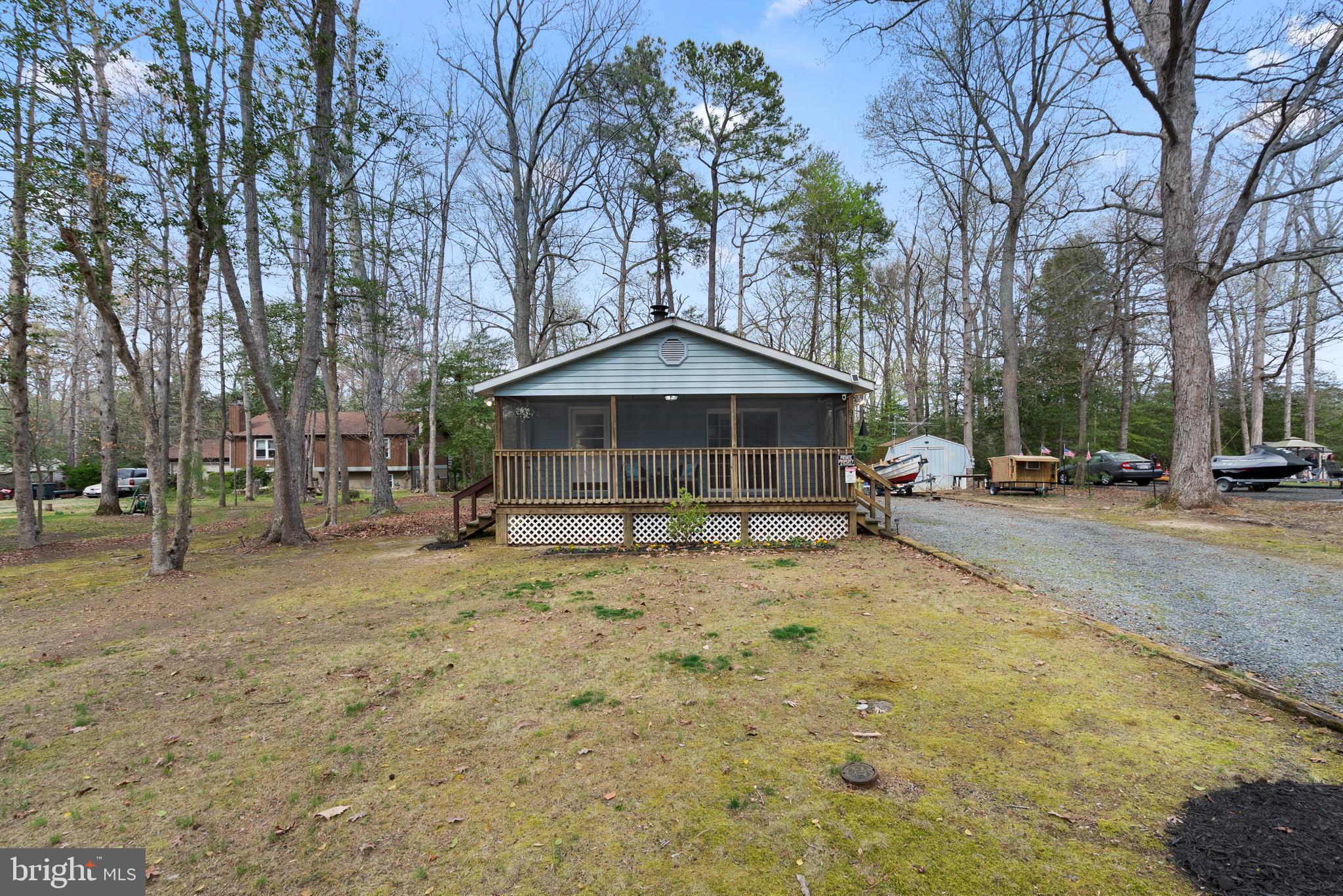 Nestled on a generous half-acre lot, this charming single-level rambler offers a peaceful retreat. Backing up to trees, the home features 3 bedrooms, 1 updated bathroom, a cozy wood-burning fireplace, and a screened-in porch—perfect for enjoying the outdoors in comfort. Recent upgrade include a brand-new HVAC system and water heater, ensure worry-free living.  

Located in the desirable Chesapeake Ranch Estates, residents enjoy access to exceptional community amenities, including two private beaches on the western shores of the Chesapeake Bay, a lake, and scenic hiking trails. Conveniently positioned about 50 miles from Washington, D.C., 45 miles from Annapolis, and just 15 miles from Patuxent River Naval Base, this home is also a short drive from beautiful Solomons Island, known for its waterfront dining, shopping, and riverwalk.  

Discover the perfect blend of charm, nature, and convenience—schedule your showing today!