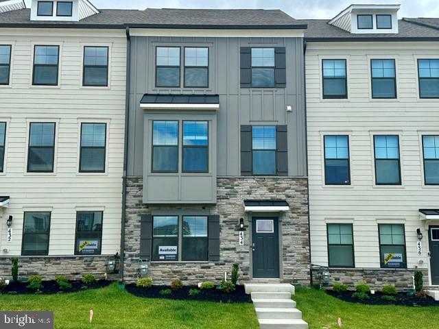 Move in ready! Welcome to Renn Quarter, the hottest new community in Downtown Frederick. This stunning Norris townhome offers the perfect blend of modern design, urban convenience, and unbeatable amenities, all just minutes from the vibrant heart of Frederick. This spacious and stylish 4 bedroom, 3.5 bath end unit townhome features an open-concept layout that is perfect for entertaining. High-end finishes and contemporary design elements make this home truly stand out. The oversized owner’s suite serves as a private retreat, complete with a large walk-in closet and ensuite bath, ideal for unwinding after a long day. A two-car garage provides private parking and additional storage space. Located within walking or biking distance to Historic Downtown Frederick, this home offers easy access to boutique shops, breweries, restaurants, and entertainment. Frederick is also recognized as one of the most dog-friendly cities in the United States. Renn Quarter is designed to be more than just a neighborhood; it is a destination. Planned community amenities include swimming pools, a clubhouse, parks, playgrounds, picnic pavilions, dog parks, walking trails, soccer fields, and open green spaces. Residents will also enjoy on-site shops, and restaurants. This beautiful home is ready for its first owner. Do not miss the opportunity to own a brand-new townhome in one of the most exciting and fast-growing areas of Maryland. Contact us today to schedule a private tour and ask about our exclusive incentives.