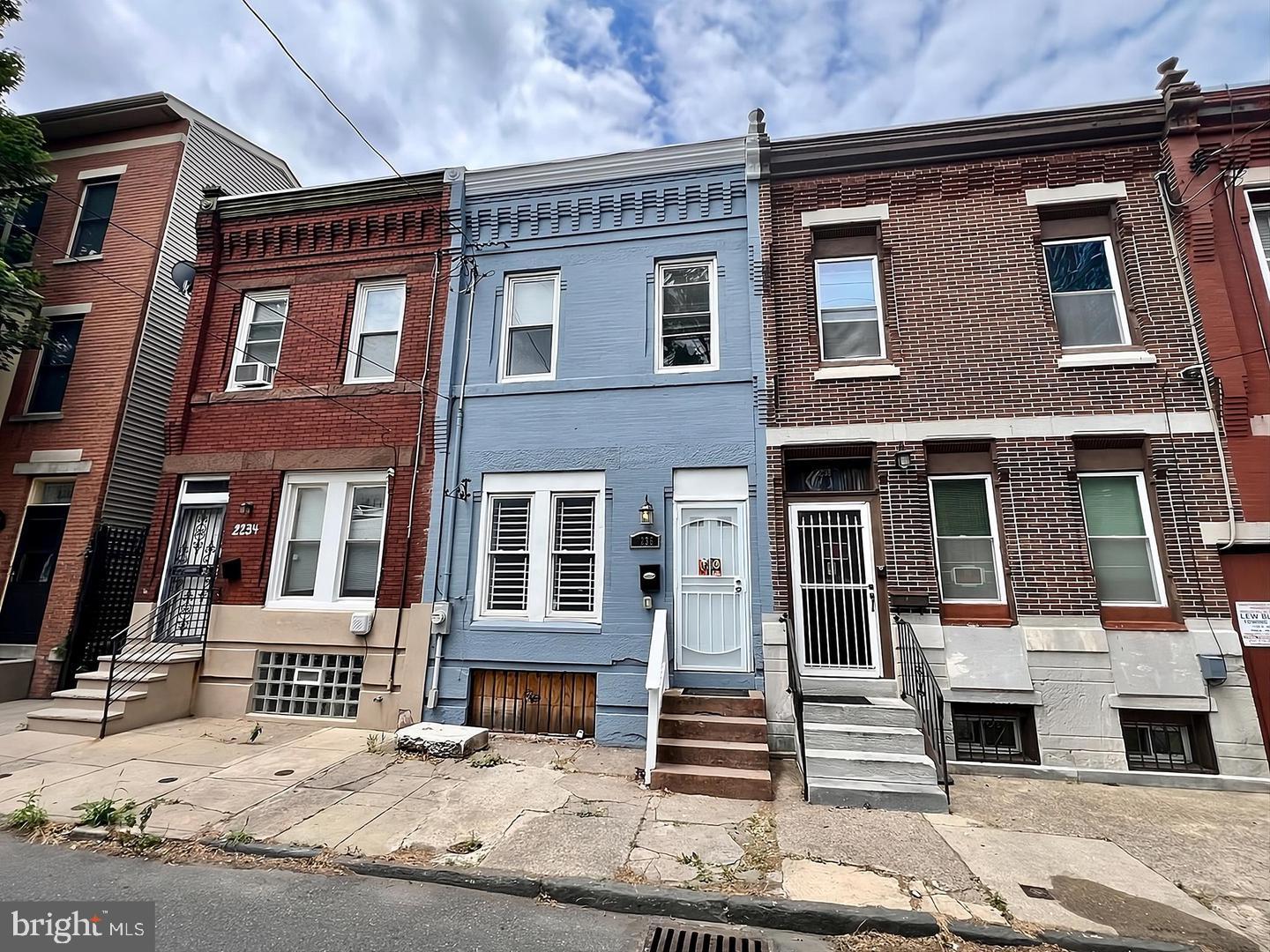 Prime investment or owner-occupant opportunity just steps from Temple University. This spacious 4-bedroom, 3-bath home offers exceptional flexibility whether you're looking to expand your rental portfolio, purchase housing for a Temple student, house hack, or make it your primary residence.

The property is currently tenant-occupied and generating $1,600 per month in rental income. Buyers may assume the existing lease or have the property delivered vacant with sufficient notice.  A recently installed HVAC system and low annual property taxes further enhance the property's long-term value.

**Please note:** The home is currently occupied, and its present appearance does not reflect its full potential. The virtually staged photos are intended to illustrate how the space can look when thoughtfully furnished and well maintained. Buyers who can see beyond the current condition will recognize the generous layout, three full bathrooms, and excellent opportunity this property offers.

Ideally located within walking distance of Temple University, public transportation, shopping, dining, and major commuter routes.