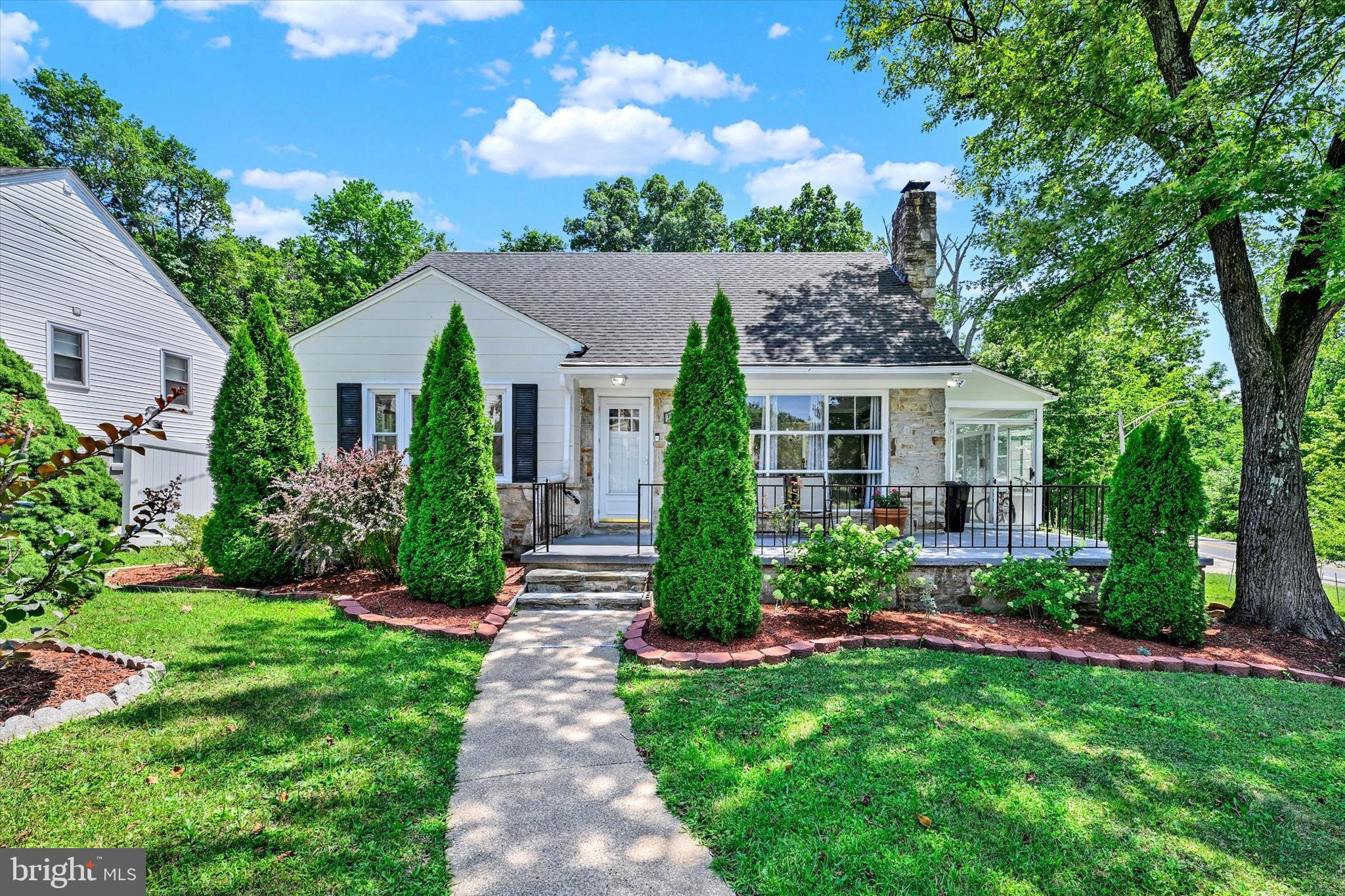 Welcome to 1901 Hillcrest Road! This charming stone Cape Cod offers 5 bedrooms and 3 full bathrooms with a spacious, functional floor plan. The main level features 2 bedrooms, 1 full bath, a bright sunroom perfect for morning coffee or breakfast, and a beautifully updated kitchen complete with modern countertops, stylish cabinetry, tile backsplash, stainless steel appliances, and a large center island. The upper level includes 2 additional bedrooms and 1 full bathroom, while the finished lower level offers a spacious open recreation area, 1 bedroom, and 1 full bathroom, providing excellent flexibility for guests, extended living, or a home office.

Additional updates include fresh paint throughout, recessed lighting, stunning laminate flooring, and beautifully renovated bathrooms. Enjoy the warmth and character of the stone fireplace and the outdoor space offered by the generously sized yard. This move-in-ready home combines classic Cape Cod charm with thoughtful modern updates in a convenient Gwynn Oak location.