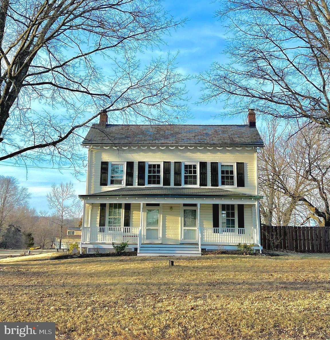 Born from humble beginnings in 1826, The Sunny Side Farmhouse, once a bustling chicken farm, is a paradisal estate nestled on three acres along the illustrious Lurgan Rd. Its charm is accentuated by dainty scalloped trim,  coupled with 'buttercup' cedar siding and a serene, meadow-white front porch, all contributing to its sweet disposition. Stepping inside, you're greeted by hardwood floors that carry echoes of the past, seamlessly blended with revitalized modern touches that provide a harmonious balance of old and new. The farmhouse-style kitchen has been tastefully renovated, adorned with leathered granite countertops and newer appliances. Both the living and dining areas boast generous ceiling heights and stylish light fixtures that cast a soft glow against the seductive, smokey grey walls.  Climbing the stairs, you'll discover three cozy bedrooms, a sun-kissed office, and a full bath with a newly updated vanity and  marble walk-in shower. Further up the winding staircase, two bonus rooms are ready to be adapted to any use you desire. The alluring outdoor area, complete with an inviting in-ground pool, gives way to breathtaking views of a neighboring horse farm, a sight that supports the surreal ambiance. Nestled within the boundaries of the award winning Council Rock School district, Lurgan Rd is an undoubted jewel amongst the most scenic roads of Bucks County. Your idyllic rural sanctuary awaits at The Sunny Side Farmhouse, where hope and history intertwine.