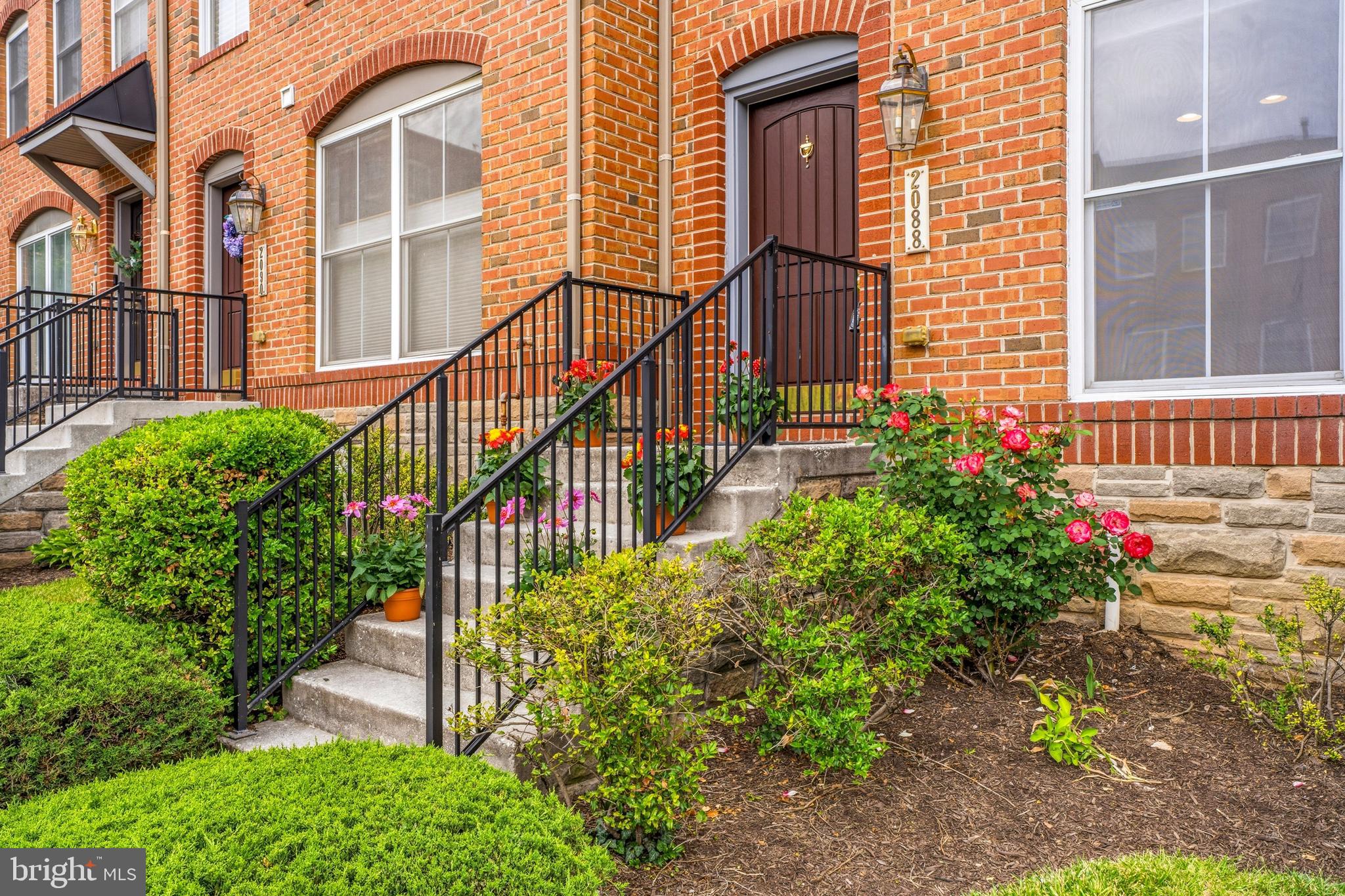 Tucked into the quiet enclave of Clipper Mill adjacent to the north entrance to Druid Hill Park, this turnkey 3 bedroom brick front townhome offers modern luxury and low maintenance city living amidst one of Baltimore’s most architecturally unique neighborhoods. Steps away from Artifact Coffee and convenient to all Hampden has to offer, the home is also located along the Woodberry Light Rail Station and near I-83, making commuting effortless to Penn Station, Johns Hopkins University, and downtown Baltimore. 

This approximately 2,000 square foot home features 3 bedrooms, 2 full baths, 2 half baths, kitchen, dining area, living area, and bonus room across three thoughtfully designed levels. A Trex deck off the kitchen is perfect for al fresco dining and entertaining. The attached two car garage with a parking pad and additional neighborhood visitor parking is a luxury for city living. 

The current owners have completed numerous high quality updates, including a renovated powder room, refreshed primary and hall baths, recessed lighting in two bedrooms, and custom built in closets. Additional improvements include a new dishwasher and stove, garage door motor with remote access capability, two new front facade windows, and extensive shelving and cabinets in the garage and laundry area.

Enjoy summers exploring the Jones Falls Trail and lounging at the iconic Clipper Mill Pool with lunch delivered from Woodberry Tavern. The $230 monthly HOA fee includes pool membership, snow removal, and landscaping. 

This exceptional Clipper Mill residence delivers an unmatched combination of location, lifestyle, and convenience.