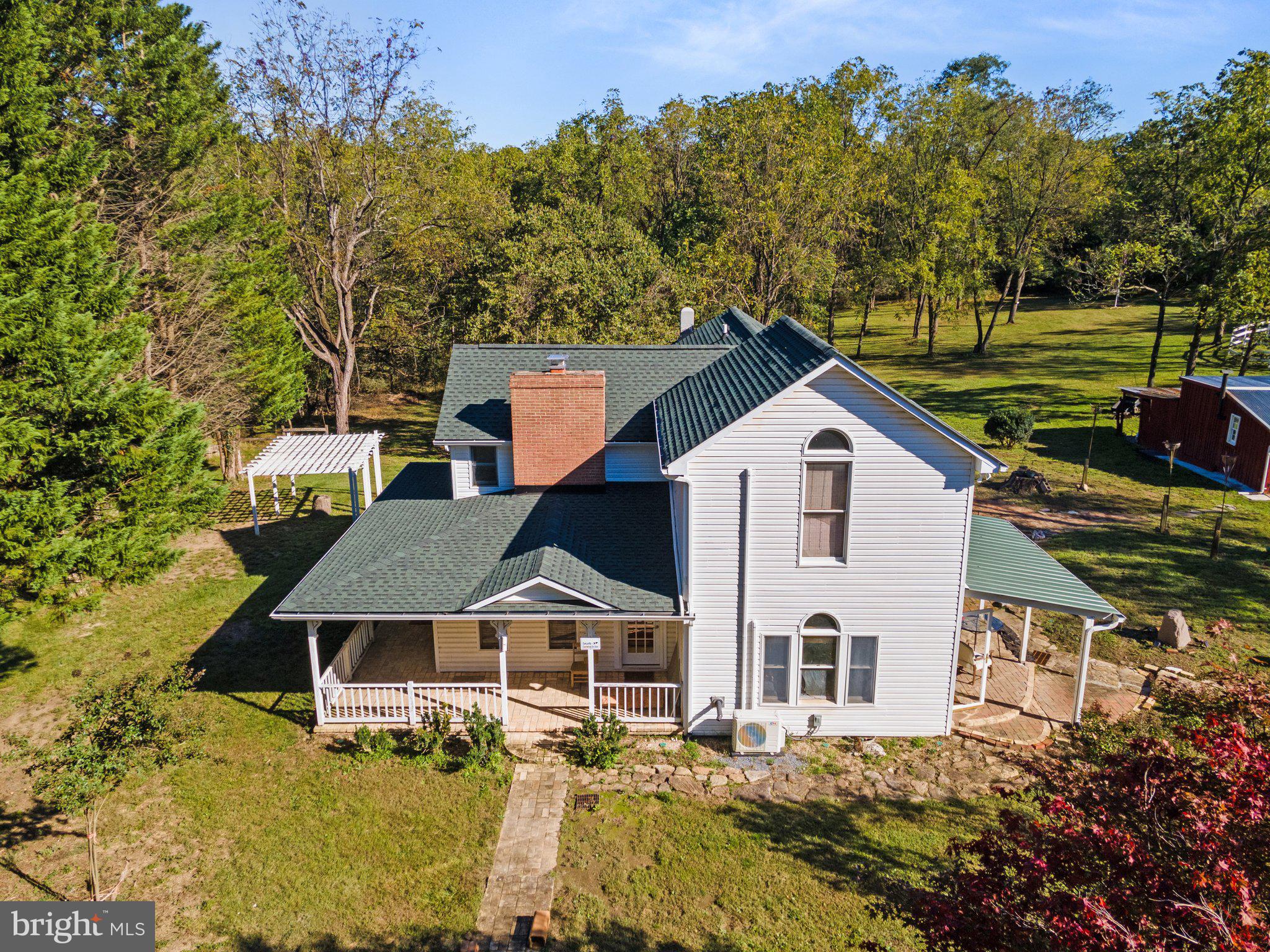 INVESTOR'S DELIGHT – CASH FLOW & GROWTH OPPORTUNITY

This unique 6.25-acre property, located in a pristine and highly desirable area bordering Fort Frederick State Park, presents a rare opportunity for investment, development, and growth. Surrounded by natural beauty, this versatile property offers diverse possibilities, from a private retreat to a range of business ventures. Situated just a mile from Interstate I-70 and close to Big Pool Lake and Whitetail Ski & Golf Resorts, the property promises both convenience and serenity.

Property Features:
Renovated Single-Family Home: The home sits on beautifully maintained grounds with a recently installed new foundation beam, roof, siding, gutters, and an upgraded electric panel. A secure main gate and two side gates, along with a freshly painted fence, offer privacy and charm.
Interior Enhancements: The spacious living room, front room/office, and adjacent family room feature newly renovated wood details and upgraded chimneys, exuding warmth and character. A spacious sitting room precedes the master bedroom on the upper floor, adding a cozy retreat within the home.
System Updates: Newly installed plumbing and electrical updates were completed by a licensed electrician, and the upgraded septic system has been cleaned and serviced for efficiency. The home also includes a split electric system for upstairs and downstairs climate control.
Modern Infrastructure: A new gravel driveway (installed in August) and paved access on both sides of the property enhance accessibility. Recently installed metal gates line the property, and a survey map outlines clear boundaries and features.
Outbuildings: A newly painted workshop/shed with updated electric connectivity includes an electrical compressor, cabinets, and shelving, while the two-level barn and secondary entrance storage shed offer substantial additional space. All three structures feature durable metal roofs.
Pest and Termite Control: A termite control system has been professionally installed, and the property has been cleared of surrounding vegetation, enhancing curb appeal and safety.
Natural and Recreational Amenities:
Scenic Pond: A large pond stocked with fish lies just behind a tranquil, forested area with walking trails, providing a serene backdrop for events such as weddings, wellness retreats, and gatherings. The scenic setting, with trees and expansive green space, is perfect for outdoor activities and hosting events.
Environmental Conservation Zone: The property is within a conservation zone, ensuring the preservation of its natural surroundings and safeguarding against future development. The location across from Fort Frederick State Park offers a protected environment perfect for nature enthusiasts and hunting groups.
Renovation Highlights:
Partially Renovated Home: This charming residence includes an operational wood stove and a split electric system in excellent condition. Renovations include the master bedroom, walk-in closet (flexible as a bedroom or TV room), and two bathrooms ready for finishing touches.
Original Charm and Upgrades: The kitchen includes a cook-stove and washer/dryer hookups, while the living room and office retain original wood floors, offering timeless appeal. New wood ceilings in the family room and office add warmth and luxury.
Investment Potential:
With its prime location, upgraded infrastructure, and natural beauty, this property is an ideal investment for those seeking cash flow opportunities through rentals, Airbnb, wellness retreats, or event spaces. The expansive grounds, coupled with modern amenities and serene surroundings, make it a versatile property for both personal and business use.

Don’t miss this incredible opportunity to own a property with diverse potential in a stunning location. Contact us today to schedule a viewing!