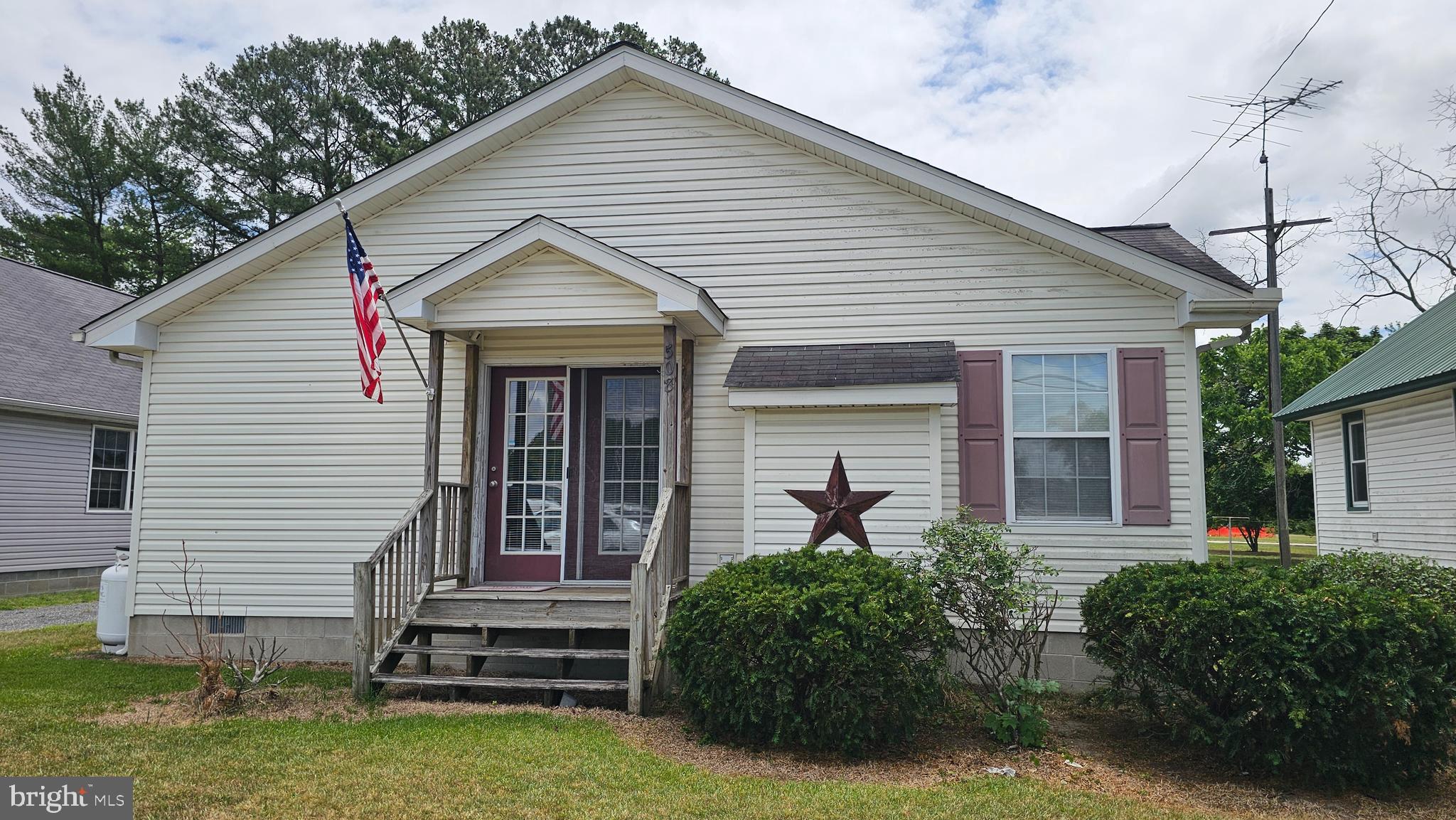 Enjoy convenient one-level living on the north side of Denton, just a stone's throw from Bullock's and with easy access to Route 404 for commuting. Built in 2002, this charming 3-bedroom, 2-bath cottage offers a comfortable and functional layout. Enter from the side porch into a welcoming foyer that opens to the spacious living room, featuring a vaulted ceiling and cozy gas fireplace. Upgraded flooring throughout the main living areas and bathrooms adds style and durability.

Outside, a gravel driveway and carport located at the rear of the home provide convenient off-street parking and easy access. Whether you're looking for your first home, downsizing, or seeking a low-maintenance property, this home offers the perfect blend of comfort, functionality, and convenience.