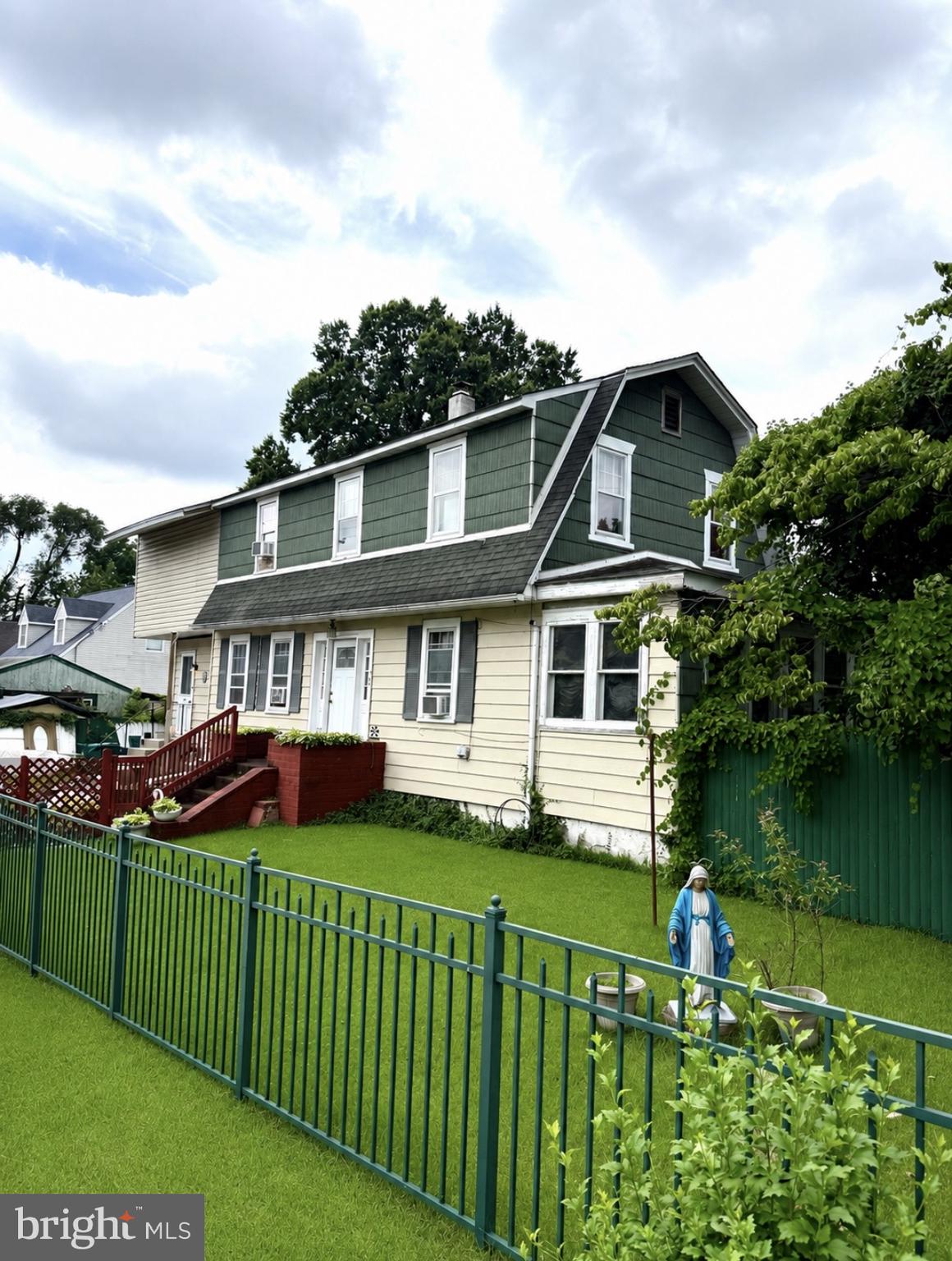 UPDATE: Open house scheduled for Sat 7/11 and Sun 7/12 from 12-2pm. Due to an overwhelming amount of interest, we will not be accepting any private showings outside of the open house times. Welcome to 906 Washington Avenue, a spacious home situated on a large corner lot offering incredible potential for its next owner. Lovingly maintained by the same family for over a decade, the sellers are ready to begin their next chapter in retirement, creating a fantastic opportunity for an investor or buyer looking to build equity through renovations. Enter through the rear entrance into the generously sized eat-in kitchen featuring wood cabinetry and ample space for everyday dining. The main level flows from the kitchen into the formal dining room, spacious living room, and an enclosed sunroom, providing flexible living and entertaining spaces. The second floor offers two generously sized bedrooms, including a front bedroom with an oversized wall-to-wall closet. A full hall bathroom is centrally located, along with access to the walk-up attic. Toward the rear of the home is an unfinished addition originally intended to become a primary suite, complete with a partially completed full bathroom featuring a dual vanity and stand-up shower. This space offers an excellent opportunity for a buyer to complete the project to their own taste. 
Outside, the oversized corner lot provides plenty of outdoor space and includes a detached two-car garage in need of repairs. Also a 2 tiered deck that is perfect for entertaining. The property is being sold strictly AS-IS. The seller will remove all of the vehicles on the property and some personal property/debris prior to settlement; however, any remaining items will be the responsibility of the buyer. Buyers should also be aware that an addition permit opened in 2019 was never finalized due to incomplete work. A hold harmless agreement will be required in connection with the unfinished permit. Whether you're searching for your next renovation project or an investment with tremendous upside, this property offers endless possibilities. Schedule your private showing today. Please contact the listing agent with any questions.