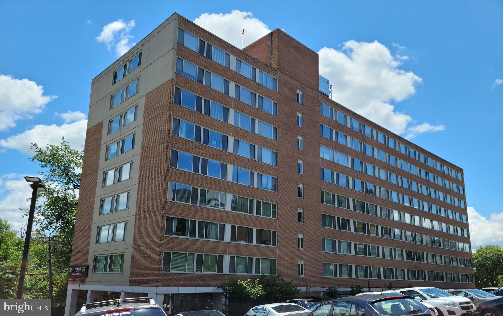 This spacious 750 square feet, one-bedroom condo at Taft Towers offers a hard-to-beat combination of location, convenience, and comfort. Just two blocks from the Courthouse Metro and less than 10 minutes into Washington, D.C., this home is ideal for commuters and anyone who values easy access to the city. You are surrounded by everything you need: shops, restaurants, coffee houses, fitness studios, parks, grocery stores and services. Stroll to the weekly Courthouse farmers market every Saturday or catch a movie at the AMC theater near the Metro. For outdoor enthusiasts, the Iwo Jima Memorial is just 15 minutes away on foot, and Arlington’s extensive jogging and biking trail system is close at hand. For frequent travelers, the location offers unmatched access. Ronald Reagan Washington National Airport is less than five miles away — about an eight-minute Uber ride — and also reachable by Metro. Dulles International Airport is likewise Metro-accessible, eliminating the need for high parking fees and making long-distance travel simple and affordable. The unit itself balances charm with smart updates. The kitchen has granite countertops, and the bathroom has been fully renovated with modern finishes. A rare, custom three-section closet system provides exceptional storage space that far exceeds typical one-bedroom layouts. Large windows along the back wall allow natural light to fill the living space, creating a bright and inviting atmosphere throughout the day. Taft Towers is a restricted access building that offers features many Arlington residents seek but rarely find at this price point. A large community pool with BBQ area provides the perfect setting for summer gatherings. The rooftop deck delivers panoramic views of the D.C. skyline — especially stunning for watching the Fourth of July fireworks. With parking included, coming home is always stress-free. Pets are welcome, and professional on-site management keeps the property well cared for. This location supports every lifestyle. Enjoy a morning workout in one of the nearby fitness studios, stop for a fresh coffee on your way home, pick up produce at the farmers market, and then spend the afternoon exploring parks or trails. Evenings can be spent dining out at local restaurants, catching a film, or relaxing by the pool. For commuters, few places make the daily trip into D.C. this seamless — whether by Metro, car, or bike. Beyond being a great home, this condo is also a strong investment. If life takes you elsewhere, the unit is turnkey for rental. Arlington rents remain strong due to constant demand from government, private sector, and military professionals seeking quality housing near D.C. The combination of location, amenities, and building management makes it easy to attract tenants at competitive rates. The condo fee includes all utilities except your internet and phone. This is truly easy living.
