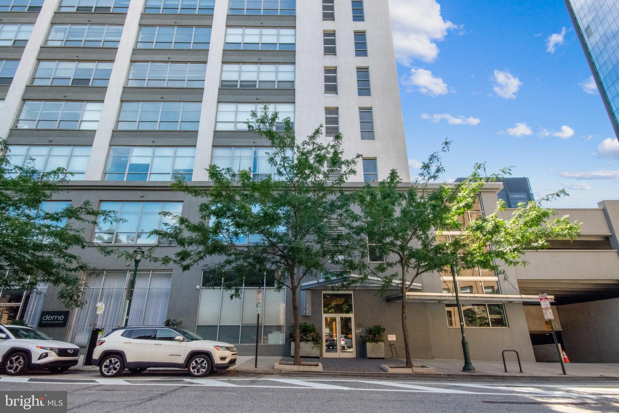 Welcome to 2200 Arch St Unit #416.  Center City Luxury Living at its finest !  Located in the heart of Logan Square, 2200 Arch St is an award winning New York style loft building.  This expansive 1 bedroom 1.5 bathroom condominium has an amazing spacious open concept living area with hardwood flooring throughout, high 14 foot ceilings and a wall of windows allowing in plenty of natural light with stunning views of Center City Philly.   Entire unit has just been freshly painted.  Along one wall contains modern kitchen has stainless steel appliances, an abundance of cabinet space and granite countertops. Walk down hallway to half bathroom, followed by spacious private bedroom with spacious walk-in closet, its own full bathroom and utility closet which includes its own washer/dryer.  The 2200 Arch building also includes 24 hour security at front desk, a fitness center, and is pet friendly. Your unit comes with its own ONE CAR assigned personal PARKING SPACE (246) in private parking garage.  HOA includes common area maintenance, exterior maintenance, snow removal, trash removal, insurance, 24/7 security at front desk with concierge service at front desk and elevators leading up to your unit.  Property is conveniently located minutes from I-76, I-676 and I-95. Walking distance to finest restaurants the city has to offer, plenty of local coffee shops and food shopping including Giant and Trader Joe's.  Building is also a short walk to Market Street, Art Museum, Suburban Station and Amtrak's 30th Street Station. This property checks all the boxes and includes all the amenities luxury living has to offer ! Make your offer today.