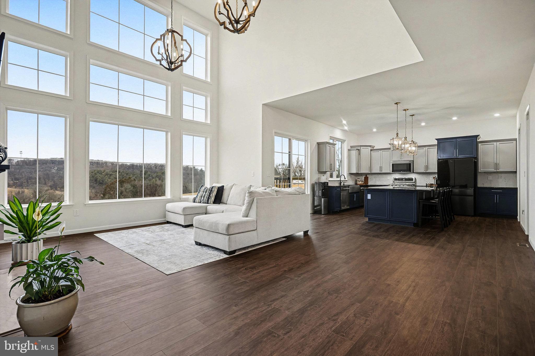Enjoy the benefits of new construction—without the wait!  Built just four months ago, this stunning home in the highly desirable Bridgewater community offers the rare opportunity to enjoy new construction living—immediately—with breathtaking golf course views and upscale finishes throughout.

Perfectly positioned on a premium lot in York’s sought-after 17402 area, 802 Blake Drive showcases a striking stone front elevation and exceptional curb appeal, setting the tone for what awaits inside.

From the moment you enter, you’ll be impressed by the soaring 10-foot ceilings, elegant 8-foot doors, and bright, open-concept design. A private home office and dramatic two-story family room create the perfect balance of comfort and sophistication, while oversized windows flood the home with natural light and frame peaceful views of the fairway.  Premium upgrades throughout the home.  

At the heart of the home, the gourmet kitchen shines with upgraded cabinetry, a spacious extended island, granite countertops, new appliances, and a large walk-in pantry—ideal for entertaining and everyday living alike.

Designer touches continue throughout with luxury vinyl plank flooring, plush carpeting, and a stunning floor-to-ceiling gas fireplace that adds warmth and style.

Retreat to the primary suite, your own private oasis, featuring a lighted tray ceiling, spa-inspired ensuite bath, and an expansive walk-in closet. Each additional bedroom also offers its own walk-in closet, ensuring space and comfort for everyone.

Step outside and unwind in your backyard sanctuary, perfect for summer gatherings, morning coffee, or quiet evenings overlooking the golf course. Whether you play or simply love open views, this setting is truly special.

Located close to shopping, dining, parks, and major commuter routes—and within the award-winning Dallastown Area School District—this home delivers the perfect blend of luxury, convenience, and lifestyle.

This move-in-ready, nearly new home with premium upgrades and incredible views won’t last. Schedule your exclusive showing today and experience Bridgewater living at its finest!