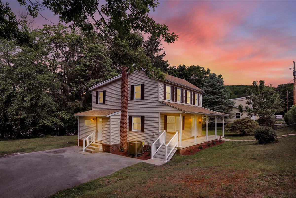 Welcome to this beautifully renovated 5-bedroom, 3-bathroom home offering nearly 2,000 square feet of thoughtfully designed living space. Completely remodeled from top to bottom, this move-in-ready property features all new electrical, plumbing, roofing, heat pump system, central air conditioning, flooring, fixtures, and finishes, providing the peace of mind and comfort of a brand-new home.

The spacious open-concept first floor is perfect for modern living and entertaining, featuring a stunning new kitchen equipped with brand-new stainless steel appliances, ample cabinetry, and generous counter space. Luxury vinyl plank flooring flows throughout the home, creating a seamless and elegant look.

The expansive primary suite serves as a private retreat, complete with its own entrance and en-suite bathroom. With five generously sized bedrooms and three full bathrooms, there is plenty of space for family, guests, a home office, or multi-generational living.

Outside, you'll find a detached two-car garage, ideal for parking, storage, or a workshop, along with a large driveway offering parking for three or more additional vehicles. Every detail of this home has been carefully curated and updated for its next owners, blending modern amenities with comfort, functionality, and style.

If you're looking for a turnkey property where everything has already been done for you, this exceptional home is a must-see.