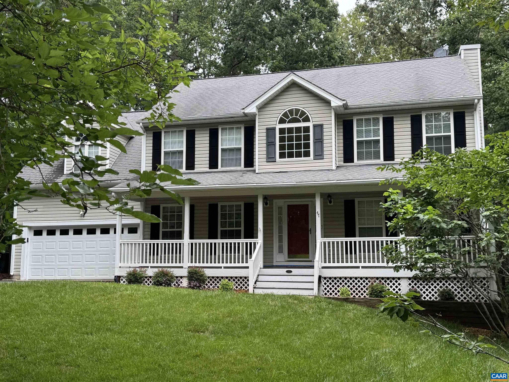 This inviting two-story home offers room to live, relax, and create. With 5 bedrooms and 3.5 baths, the home includes a spacious living room, formal dining room, and an eat-in kitchen accented by beautiful granite countertops. The full basement adds valuable versatility with a cozy family room featuring a surround-sound speaker system plus a flex area perfect for crafting, projects, or additional storage. Enjoy the convenience of two laundry hook-up locations, a level yard, and a private, peaceful setting, all close to Lake Monticello shopping and amenities. **some photos are virtually staged,Granite Counter