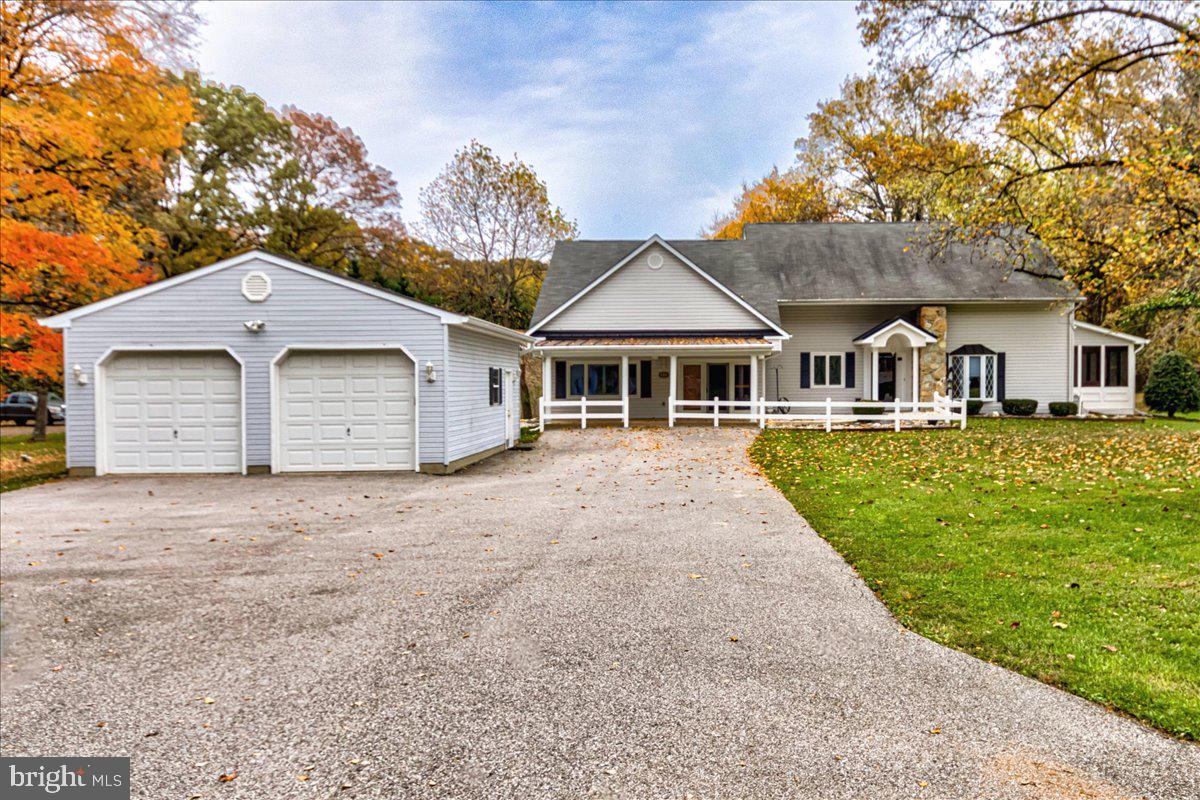 Introducing your dream single-level living experience at 833 White Ave, where luxury, comfort, and convenience come together on a sprawling one-acre lot.  This charming abode features three spacious bedrooms and two well-appointed baths, all seamlessly connected by hardwood floors that create an inviting atmosphere throughout the home. The gourmet chef kitchen, with top-of-the-line appliances and a generous island, is a culinary enthusiast's delight. Relax in the screened-in porch, complete with a hot tub, offering a serene retreat for stargazing or morning coffee.  Worried about power outages? Rest easy with the whole-house generator. The oversized two-car garage caters to your storage needs.  833 White Ave is not just a house; it's a lifestyle. Experience the convenience and luxury of single-level living, all within reach on this impressive one-acre property. Don't miss out on this rare opportunity to make it your forever home. Act now!
