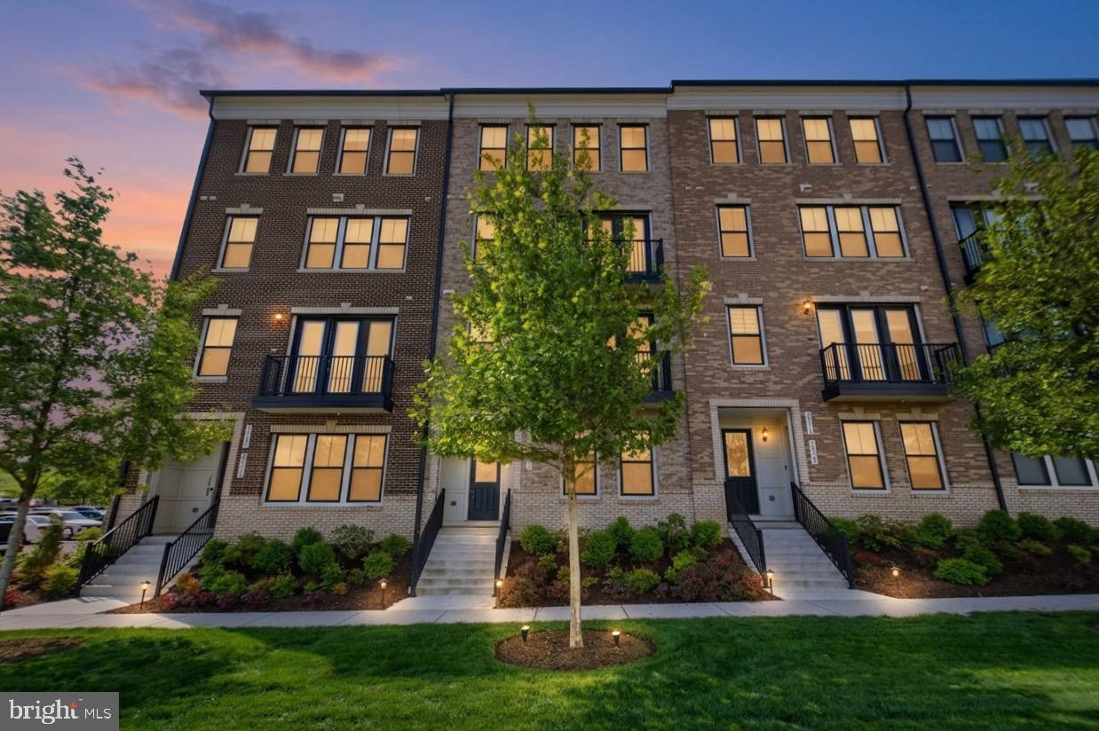Walk to Harris Teeter, restaurants, cafes, and bars. No car needed. That is Goose Creek Village.

Three bedrooms, four bathrooms, one car garage, and plenty of parking. 2,196 sq ft with views from both the main living area and the primary suite that will make you stop and take it all in.

The kitchen has everything you want: quartz island, gas range, stainless steel appliances, and subway tile backsplash, all open to the living area where the light comes in. Premium LVP flooring runs the full main level. The primary suite offers a frameless glass shower, double vanity, upgraded tile, and a walk-in closet built to handle a real wardrobe.

The HOA takes care of the exterior, lawn, snow, and trash, plus full access to the pool, fitness center, and tennis courts. You handle nothing.

Ashburn Metro Silver Line: 5 minutes. Dulles Airport: 10 minutes. Loudoun County Parkway and Dulles Greenway: direct access.
Come see it for yourself. Schedule your private tour today.