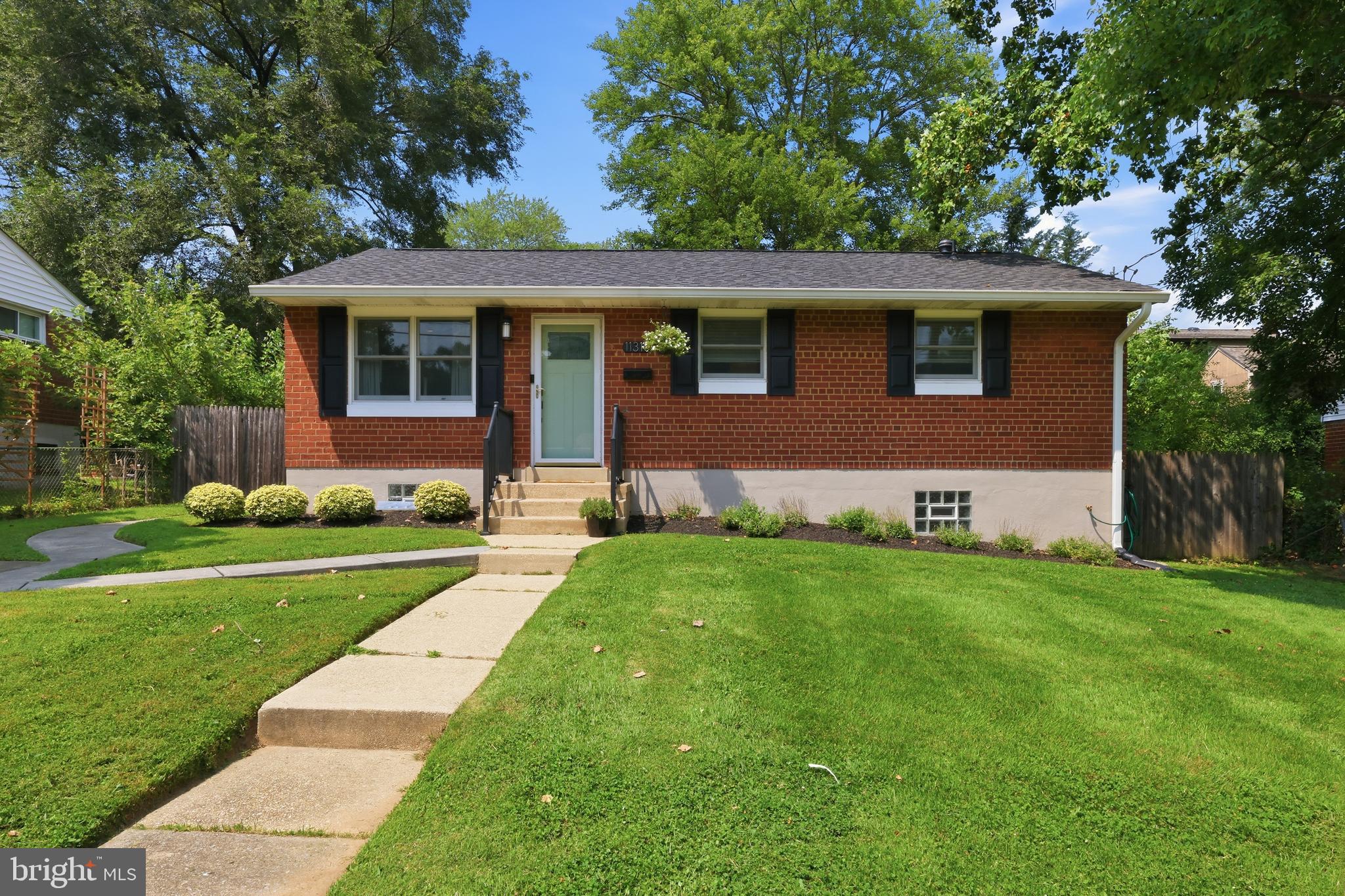 Beautifully Renovated Randolph Hills Rambler. This move-in-ready 4-bedroom, 2-bath home blends timeless charm with thoughtful modern updates in one of Rockville’s most desirable neighborhoods. Filled with natural light, the main level showcases beautifully refinished hardwood floors, an inviting living area, and a designer kitchen featuring granite countertops, a tile backsplash, stainless steel appliances, abundant cabinetry, under-cabinet LED lighting, and a newer refrigerator. Three oversized bedrooms, each with a private closet, and a full bath complete the main level. A spacious sunroom addition extends the living space and provides the perfect setting for everyday living, entertaining, or a home office. The fully finished lower level offers a private fourth bedroom, an additional full bath, flexible space ideal for a recreation room, guest suite, gym, or office, and a large finished laundry and utility room with excellent storage. More than $36,000 in recent improvements include a 1-year-old Landmark Pro architectural shingle roof, new gutters with gutter guards, energy-efficient windows and doors, updated HVAC, a newer water heater, fresh interior paint, recessed lighting, designer light fixtures, ceiling fans, smart Lutron app-controlled dimmers, a Yale touchscreen smart lock, a Ring floodlight camera, and a newer microwave. Outside, enjoy a covered rear porch and patio ideal for grilling, dining, or relaxing, with direct access to a private, level, fully fenced backyard. The beautifully landscaped and manicured grounds also feature a 6-foot privacy fence with gate, updated black aluminum front porch railings, new shutters, and a concrete driveway with one-car off-street parking, plus ample street parking. Ideally located in the sought-after Randolph Hills community, just moments from Rock Creek Park’s miles of hiking and biking trails, Pike & Rose, North Bethesda Market, Metro, MARC, I-270, and I-495, with endless shopping and dining nearby. Thoughtfully updated inside and out, this light-filled home is ready to be enjoyed from day one