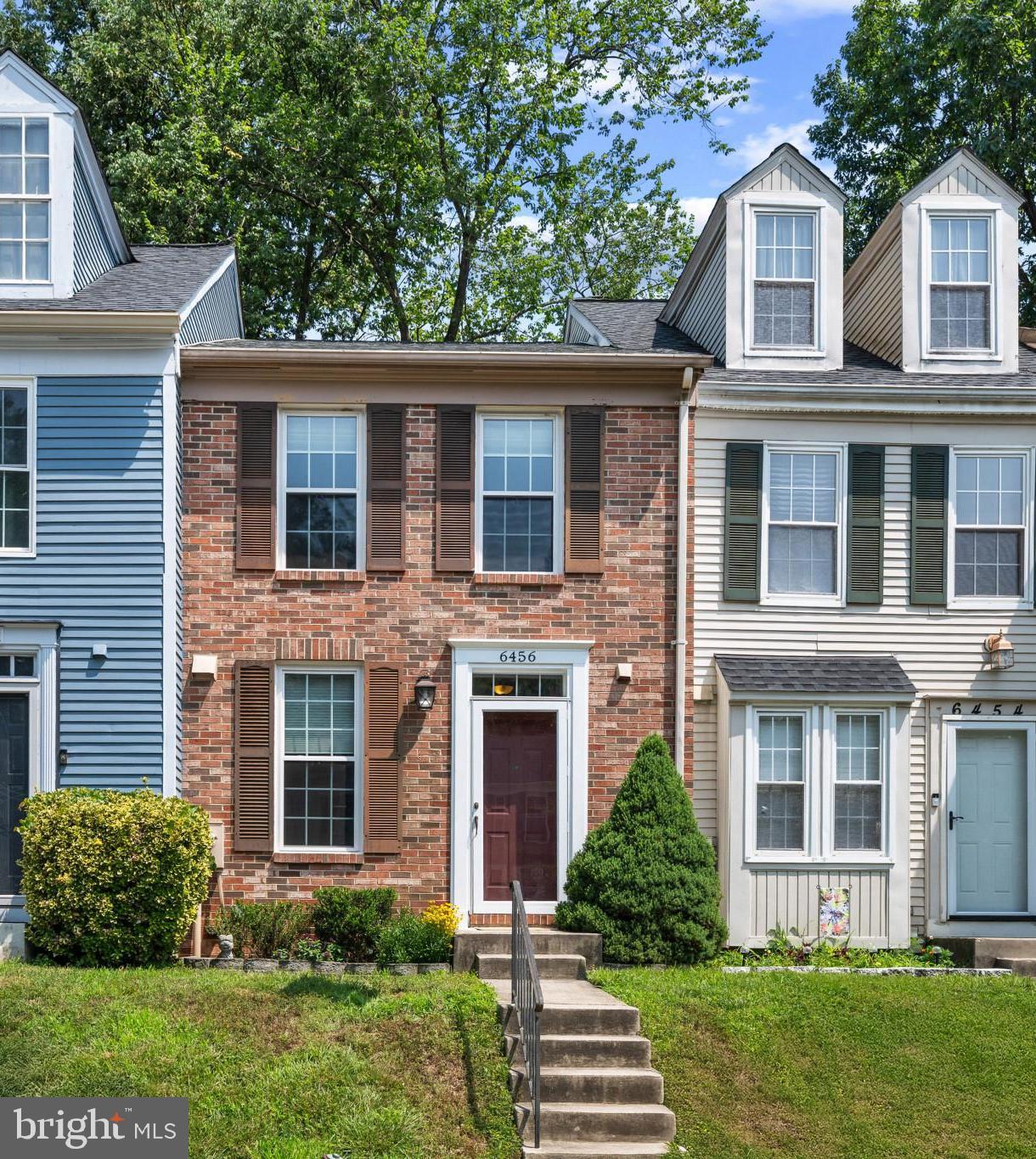 Beautifully updated townhouse residence offering 2 bedrooms, 2.5 bathrooms, and 1,409 finished square feet in highly sought-after Marble Hill. // Recent improvements provide peace of mind and modern appeal, including luxury vinyl plank flooring throughout the main level and carpet installed on the upper level and staircase (2026), sump pump and pit (2025), water heater and front and storm door trim (2023), full roof replacement (2021), replacement windows, blinds, and sliding glass doors (2020), and HVAC system (2016). // Step inside to a welcoming foyer featuring an updated powder room (2018). The main level begins in the charming kitchen, complete with stainless steel appliances (dishwasher and microwave replaced in 2025), ample cabinetry and countertop space, open sightlines to the main living area, and room for a bistro table. // The adjacent dining and living areas create an inviting space for both everyday living and entertaining. A stylish chandelier defines the dining area, which is further complemented by additional lower cabinetry for extra storage. The living room is bathed in natural light from expansive sliding glass doors that open to the elevated deck. Updated with floorboards and railing in 2024, the deck overlooks mature trees, creating a peaceful, private setting for outdoor dining or relaxing. // Upstairs, you'll find two spacious, newly carpeted bedrooms and a beautifully updated full bathroom (2020). The primary suite features a generous walk-in closet with dual access to the bathroom, offering added convenience. // The finished lower level provides a versatile recreation room that can easily serve as a second living area, media room, home office, fitness space, or playroom. A second full bathroom on this level adds flexibility. // Residents of Marble Hill enjoy access to community amenities including common green spaces, tennis courts, and tot lots/playgrounds, all within a well-maintained neighborhood in a convenient location.