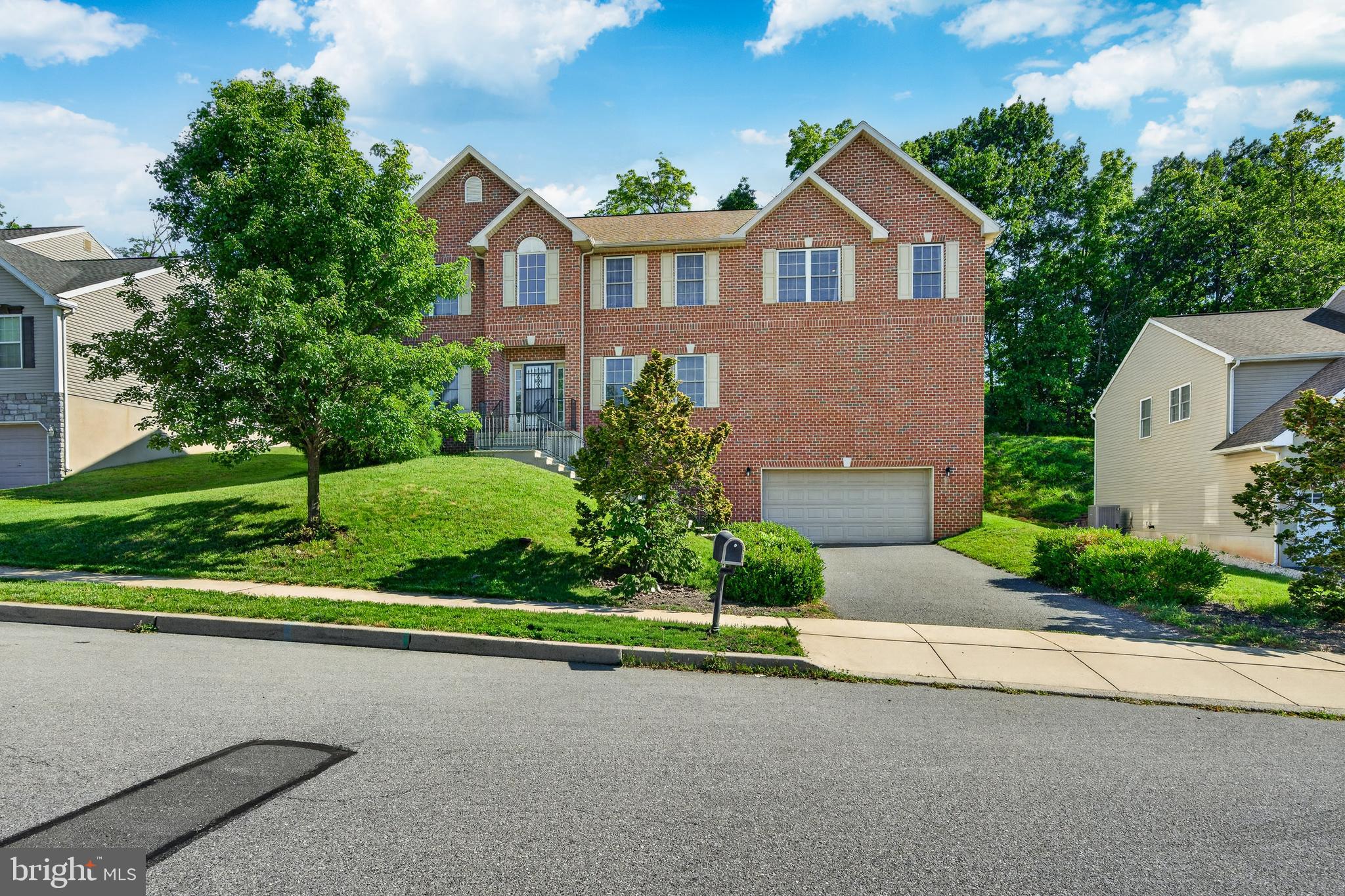 Welcome to 15 Sawgrass Drive, a spacious and beautifully designed 4-bedroom, 2.5-bath home offering the perfect combination of comfort, functionality, and flexibility in the heart of Exeter Township. From its generous living spaces to its large backyard and versatile floor plan, this home is designed to accommodate today's modern lifestyle.

Step inside to discover a bright and inviting layout featuring formal living and dining rooms, ideal for entertaining guests or hosting holiday gatherings. The heart of the home is the spacious eat-in kitchen, offering ample room for meal preparation, casual dining, and everyday connection. Just off the kitchen, the cozy family room features a gas fireplace, creating the perfect setting for relaxing evenings at home.

A dedicated media room or flex space provides endless possibilities as a playroom, home office, gaming room, fitness area, or creative studio. The convenience of a main-floor laundry room and direct interior access to the attached garage make everyday living effortless.

Upstairs, retreat to the oversized primary suite featuring a spacious bedroom, generous walk in closet space, and a private en-suite bath designed for comfort and relaxation. Three additional well-sized bedrooms and a full hall bath provide plenty of room for family, guests, or work-from-home needs. The open loft space currently serves as the perfect home office. 

The expansive basement offers even more potential with abundant space for storage, a home gym, workshop, recreation area, or additional living space. Unique garage access from both the kitchen level and basement adds exceptional functionality and convenience.

Outside, enjoy the large backyard, perfect for entertaining, gardening, outdoor play, pets, or simply relaxing and enjoying the outdoors.

Conveniently located near shopping, dining, parks, schools, and major commuter routes, this home offers the space, versatility, and location today's buyers are searching for. Don't miss this opportunity to own a move-in-ready home with room to grow at 15 Sawgrass Drive.