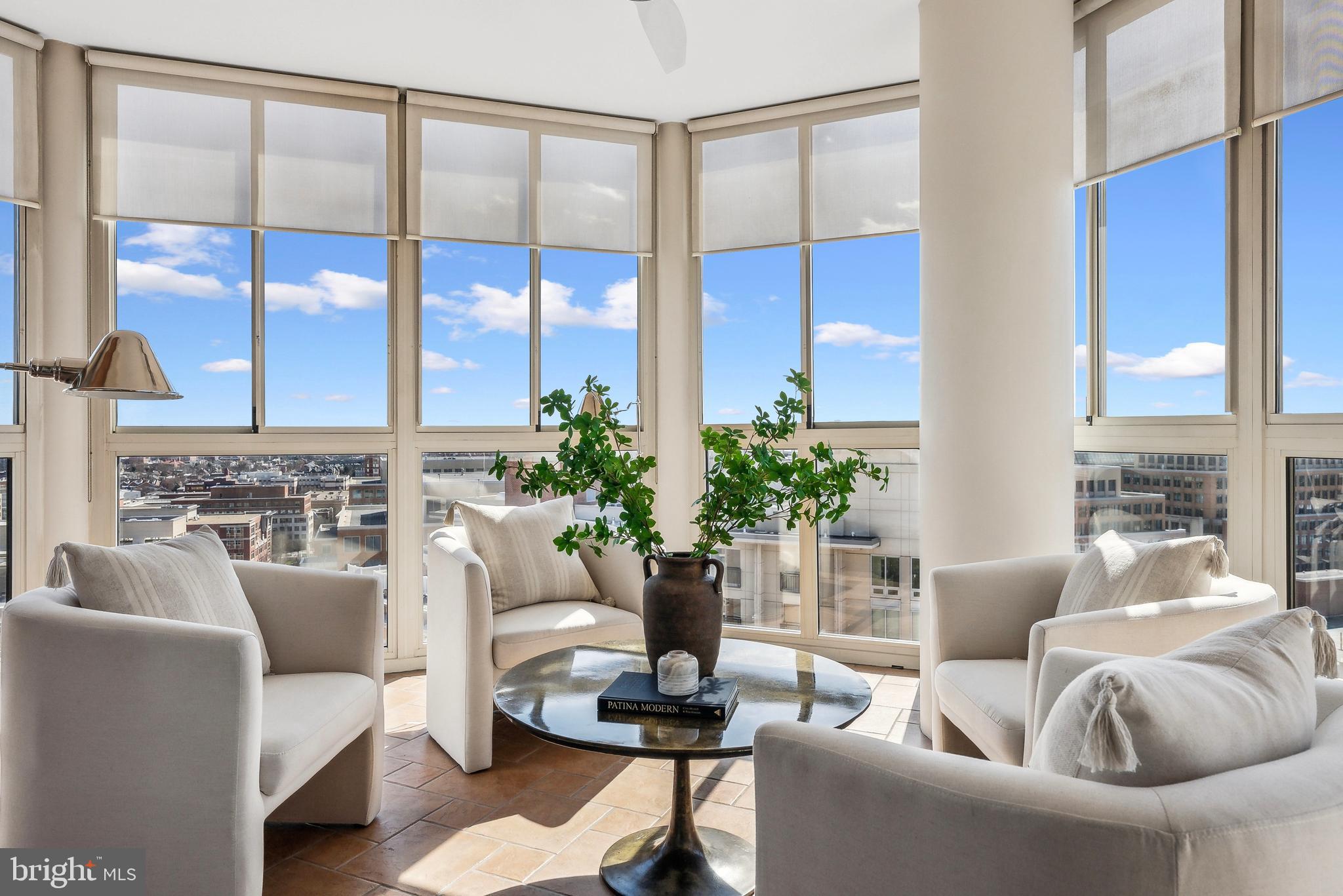 Don't miss this rare opportunity to own a stunning penthouse unit in the prestigious Carlyle Towers! Perched on the 21st floor, this exquisite 3-bedroom, 2.5-bathroom condo offers breathtaking panoramic views of the Potomac, National Harbor, Alexandria skyline and the Masonic Temple. 

Inside, discover a beautifully updated interior featuring hardwood flooring throughout the main living areas and primary suite, while the secondary bedrooms offer plush carpeting for added comfort. Freshly painted & polished, built-ins shelving & desk spaces, dramatic picturesque windows, stainless steel appliances, and so much more. Aside from the dramatic views from every space throughout this penthouse unit, a true bonus to this spectacular home is the all-season sunroom with floor-to-ceiling windows, creating a bright and airy floating balcony retreat with jaw-dropping city and water views. This unit includes a dedicated private storage space and two assigned garage parking spots. Rarely available, here is your chance to reside at the top of Carlyle. 

Located in the heart of Alexandria’s vibrant Carlyle District, Carlyle Towers offers the perfect blend of upscale amenities and unbeatable convenience. Residents enjoy a full-service lifestyle with 24-hour concierge, a state-of-the-art fitness center, two outdoor pools, tennis courts, a putting green, and even a pet-friendly dog park. The community also features a sauna, jacuzzi, and beautifully landscaped grounds for relaxation. Just steps away from the King Street Metro, Amtrak Station, and major commuter routes, Carlyle Towers provides seamless access to Old Town Alexandria’s charming shops, restaurants, and waterfront, as well as quick connections to D.C., National Landing, and beyond.