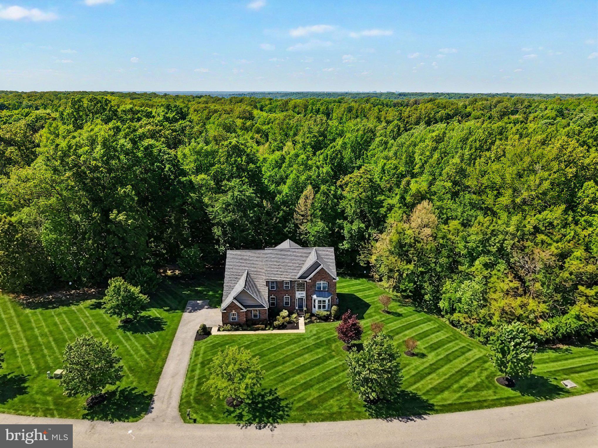 Welcome to Refined Elegance in Southern Prince George's County

Nestled on a 2-acre wooded lot in the prestigious Carlee Court enclave, this exquisite 5-bedroom, 4.5-bathroom luxury residence embodies the perfect marriage of sophistication and natural tranquility. Built in 2014, this meticulously maintained home has been hardly lived in, presenting like new with fresh paint throughout and premium finishes at every turn.  Sprinkler system and Landscape lights included.

Your journey begins the moment you step into the magnificent marble-appointed foyer, where soaring ceilings and abundant natural light create an immediate sense of grandeur. The thoughtful floor plan seamlessly blends formal elegance with everyday comfort, perfect for both lavish entertaining and intimate family gatherings.

 The gourmet kitchen stands as the heart of this home, featuring top-tier appliances, custom cabinetry, and luxurious finishes that will delight even the most discerning chef. Designed for both functionality and beauty, this culinary haven flows effortlessly into the adjacent living spaces.
 
The finished basement showcases elegant luxury vinyl flooring, providing the perfect space for recreation, home theater, fitness, or additional guest quarters.

This exclusive community offers the rare combination of privacy and proximity.  It is situated in southern Maryland.  With its pristine condition, premium appointments, and serene wooded setting, 15703 Carlee Court represents an exceptional opportunity to own a move-in-ready luxury estate in one of Maryland's most desirable communities.
