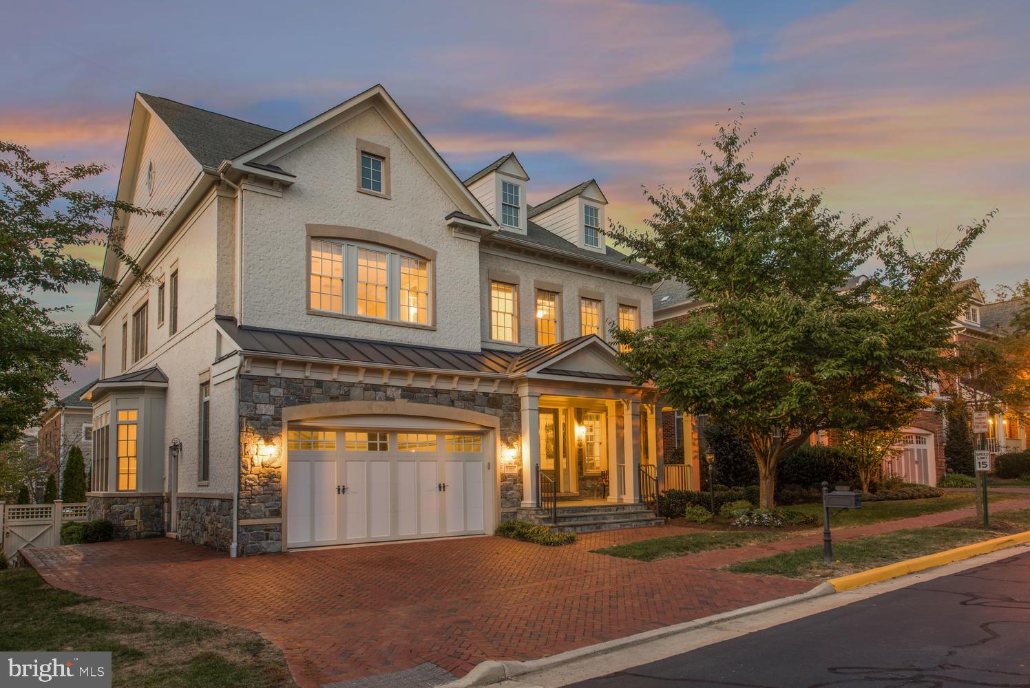 Stunning Stockwell Manor Classic on Exceedingly Private Lot is less than one mile to WFC Metro. Quality construction and open, light-filled spaces throughout. Floor to Ceiling Windows. 10' Ceilings. Extensive Custom Millwork.  Appointments like this are rarely seen at this price. Light streams in from front to back, and side to side. Heart of the house Great Room/Kitchen/Solarium will leave you breathless. The Dining Room will give you chills. When you see the patio with built in grill overlooking lush common area, you will never want to go back inside.  Until it's time for watching a movie in the amazing lower level with bar, or retiring to the owner's suite to sit by the fire.  When it's time to go back to work, your office is placed brilliantly just off the foyer where you can focus on the job a bit removed from the action in the rest of the house. You must see this property. Parking for four cars in the driveway and for two more in the garage. This is a rare opportunity for Luxury and Location beyond compare. Come Now. Open Sunday, 10/13, 1-4. Or call to see.  I'll give you a personal tour.