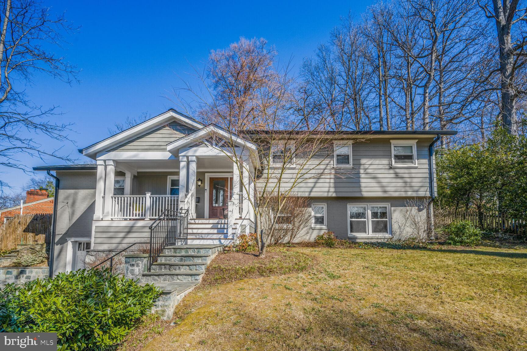 Welcome to 6103 Wiscasset Rd - a stunningly reimagined, and fully renovated single-family residence that combines a stylish modern aesthetic with efficient functionality. This home features approximately 2,300 square feet of finished living space, all of which has been completely renovated in the last 5 years.  

The main level is the hub of this home and features a completely open floor plan.  A stunning quartz waterfall island, with seating for 8, anchors the kitchen.  An abundance of sleek cabinets and modern  finishes add to the seamless flow into a large living room and dining space, which lends itself to social gatherings and easy entertaining. 
Natural light floods in through a large skylight and wide picture window with a view of the spacious flagstone patio and fully fenced back yard.  

The upper level of the home includes three bedrooms and two full bathrooms.   The primary suite features a walk-in closet, and an expanded en suite bath with a double vanity, deep soaking tub and separate shower.  

The lower level is a true haven with a family room, third full bath, and an additional room and office space that could be used as a fourth bedroom and walk-in closet.  

Thoughtfully situated with an entrance from the garage, the mud room is a perfect staging area while coming and going.  Built in shelving, extra closets, a washer & dryer, and a large storage room add to the functionality of the space.  

This home provides multiple spaces to enjoy indoor/outdoor living.  The enchanting back yard is fully fenced and landscaped - an oasis of tranquility with winding paths that meander through gorgeous azaleas and mature trees.  For even more relaxation, the front porch is a perfect spot to enjoy the lovely afternoon sun while quietly watching the world go by. 

Every inch of this home has been thoughtfully renovated with beauty, functionality and efficiency in mind.  All the kitchen appliances, major systems, windows, doors, and the roof (with new insulation) were replaced in the past 5 years.  Full membership to the Mohican Hills Pool is available for transfer - skip ahead of the wait list and enjoy all this community has to offer!  

Located in the Glen Echo Heights neighborhood of Bethesda and the Whitman school cluster, this home is the definition of turnkey, and is a true gem.
