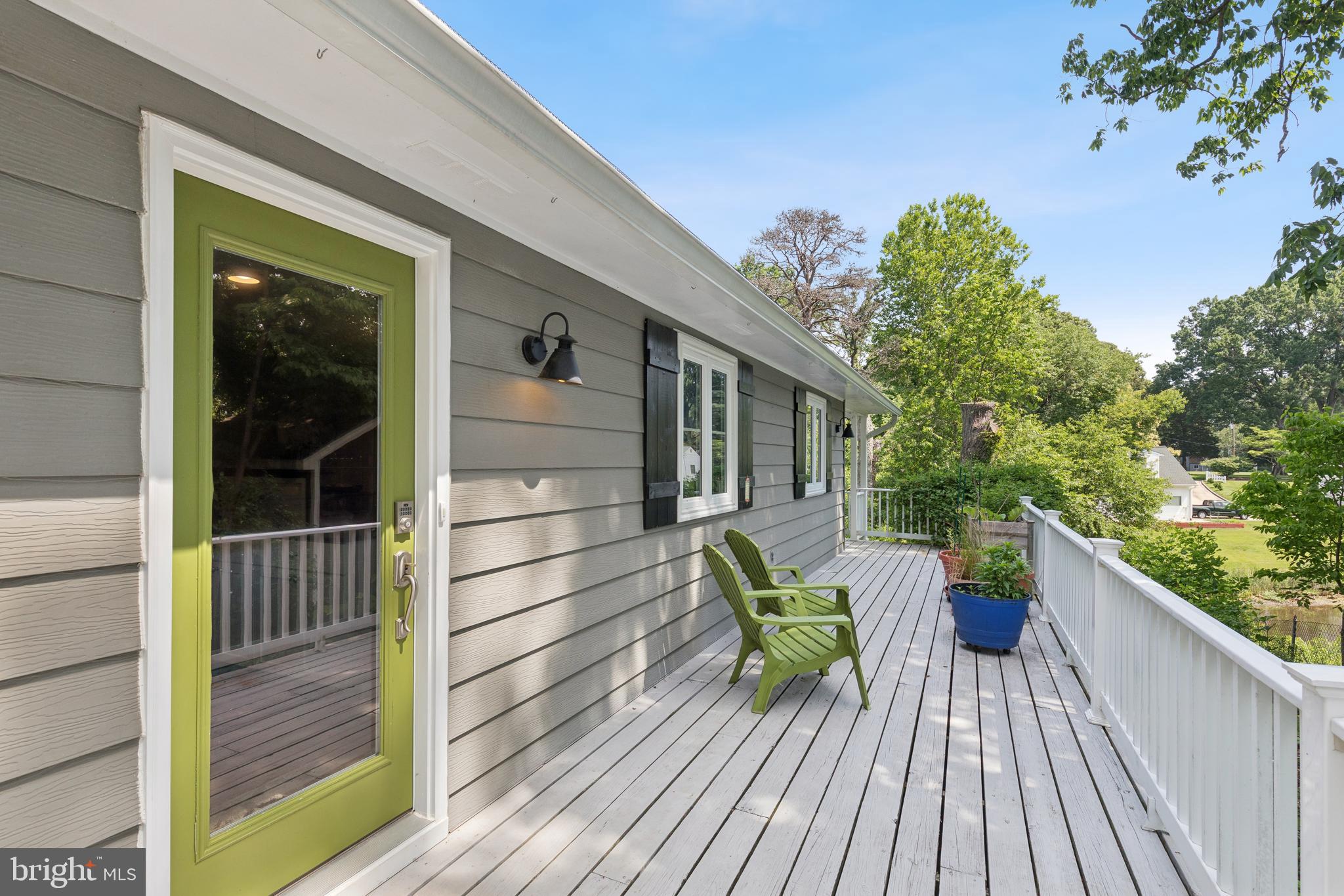 Charming Waterfront Cottage on Cypress Creek

Privately situated at the end of a quiet street, this charming cottage offers peaceful waterfront living with beautiful views of Cypress Creek and abundant natural surroundings. The open-concept floor plan is designed to maximize the scenery, allowing you to enjoy stunning water views from nearly every room.

The updated kitchen features shaker-style cabinetry, stainless steel appliances, and elegant quartz countertops. Inside, you'll find warm wood flooring, a stylish tiled bathroom, and two comfortable bedrooms with one full bath.

Outdoor living is just as inviting, with a spacious wraparound deck and a covered waterside porch—perfect for relaxing, entertaining, or simply taking in the tranquil setting. The unfinished basement provides endless possibilities for additional living space, storage, or a workshop tailored to your needs.

The current owner has thoughtfully landscaped the property with native plants that attract local birds and wildlife, creating a nature lover's paradise right outside your door.

Experience the perfect blend of privacy, waterfront beauty, and cottage charm in this unique Cypress Creek retreat.