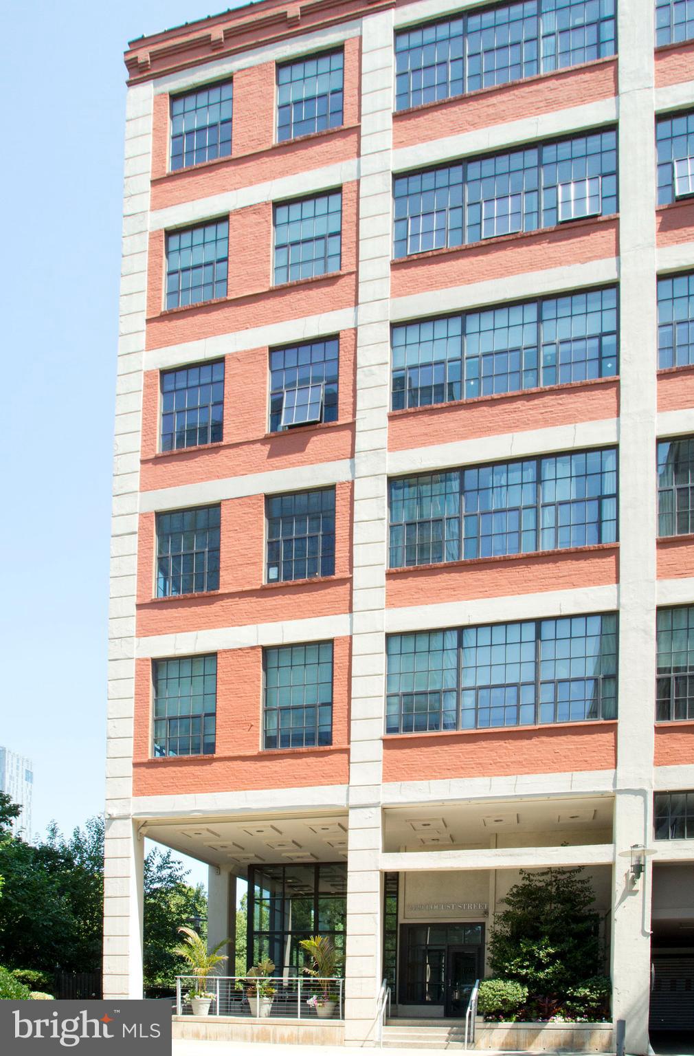 Welcome to Unit 411. This is a rare opportunity to buy one of the LARGEST 1 bdrm units with parking at Locust Point. It has been years since a 1 bedroom of this size has been available. Whilst most 1 bedrooms in the building are around 600-700 sqft this unit is over 900 sqft with the main living area roughly 20' x 19'! Add the custom flooring, custom blinds, LG washer and dryer, a 1 year old hot water heater and this unit is ready to go. Up just a few steps to the loft that accommodates a king size bed and has a walk in closet. The kitchen has Stainless Steel GE appliances as well as a large kitchen counter top that can easily accommodate 4 people. South facing and partial water views make this unit even that much more appealing. Easy parking with your own dedicated parking spot (#73) in the garage makes unloading your groceries a snap. Use the elevator in the garage to go directly to your floor. Locust Point is a pet friendly property and sits in a quiet nook of Fitler Square within a stones throw of the Schuylkill River Park and is readily accessible to UPenn, Drexel, 30th St Station as well as Rittenhouse Square. With a variety of grocery stores, shops, bars and restaurants the location can’t be better!